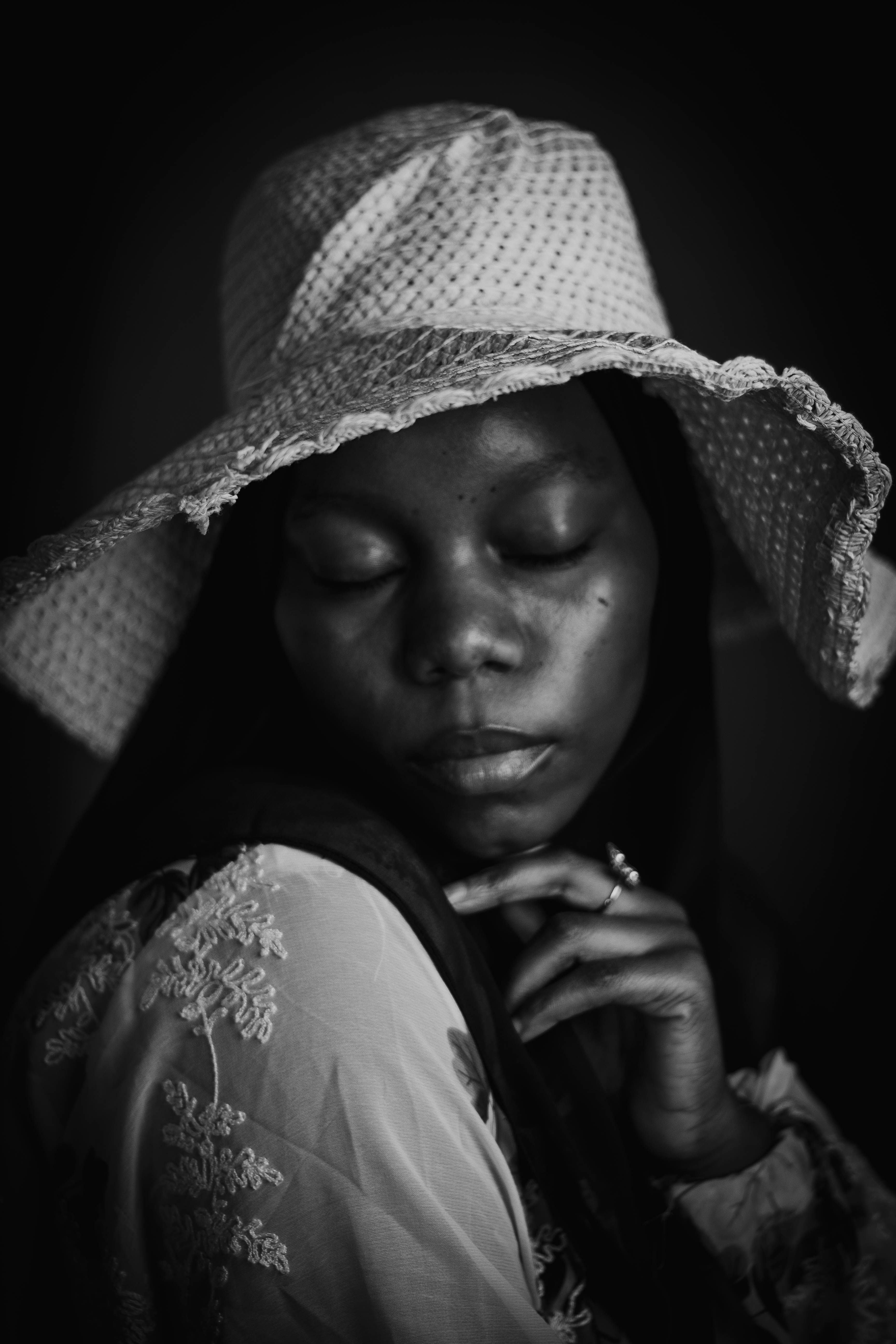 Elegant Black and White Portrait of Woman in Hat · Free Stock Photo