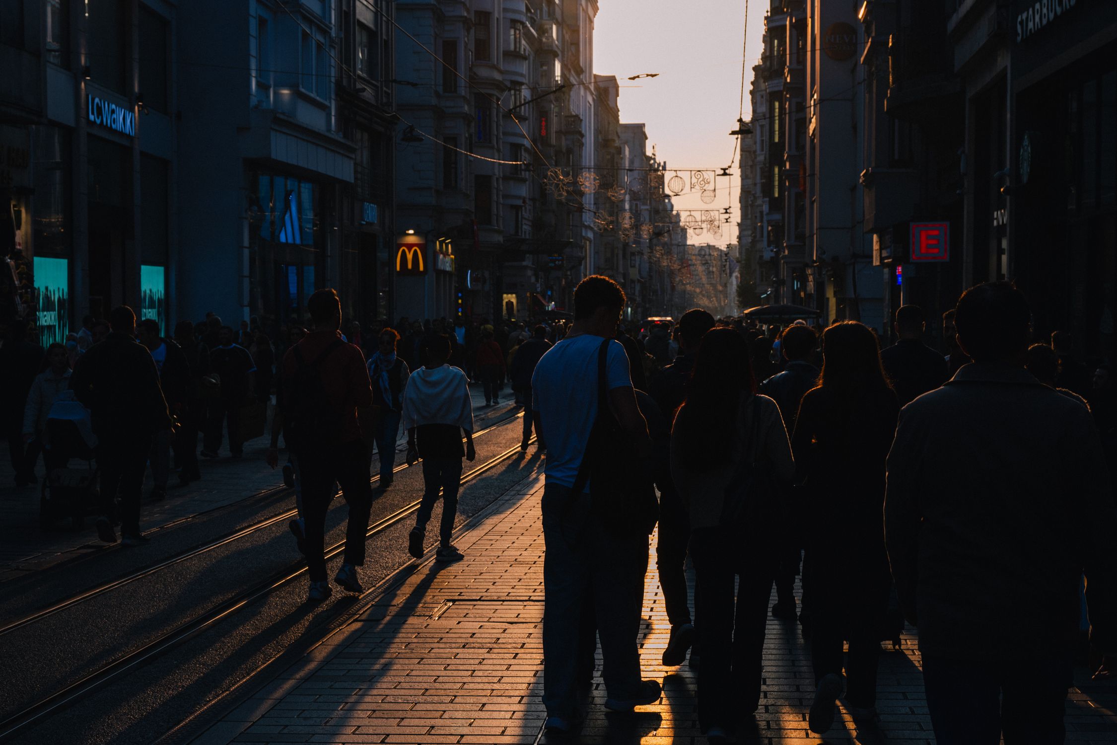 Crowded Urban Street at Sunset Silhouette · Free Stock Photo
