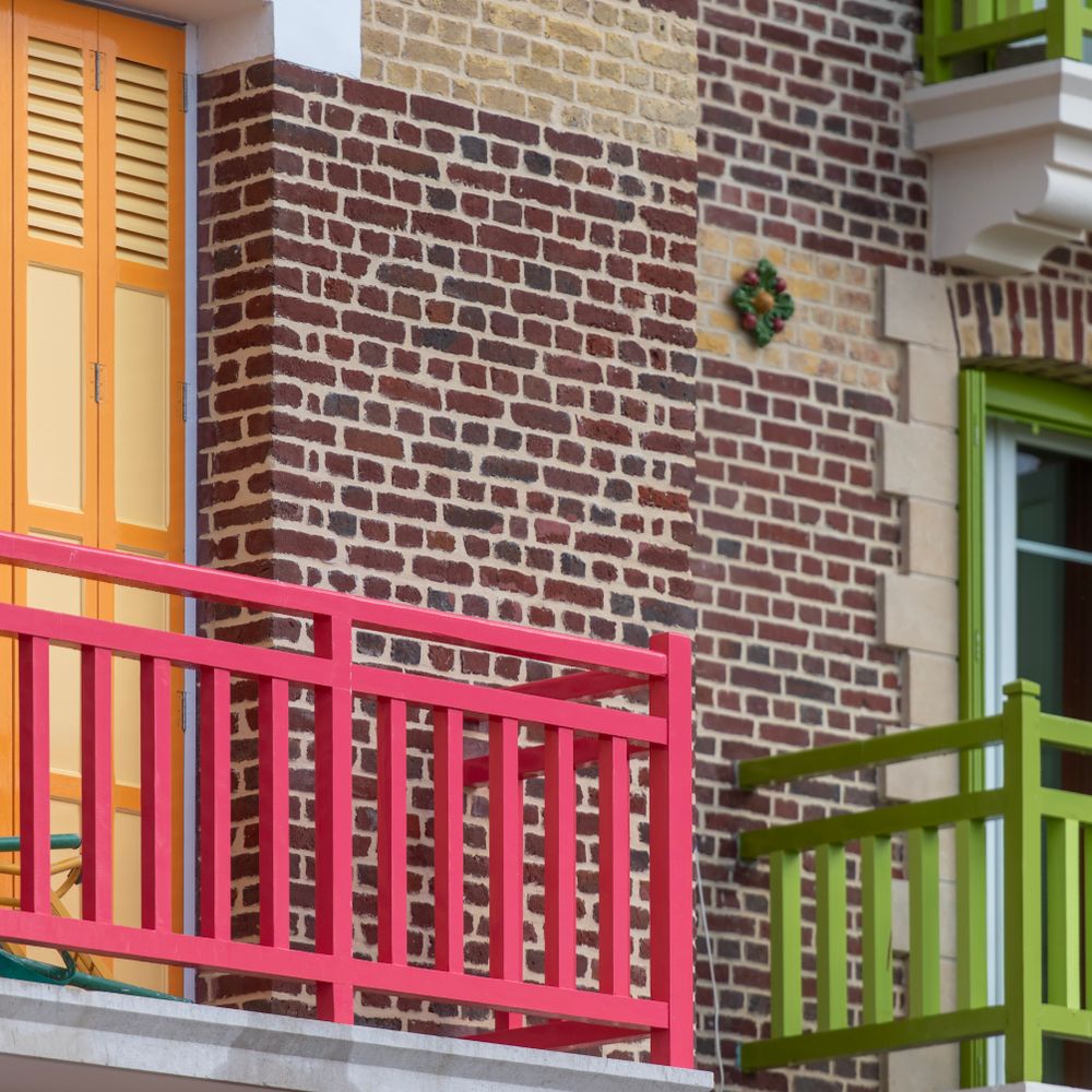 Exterior Painting in Kingston upon Thames — walls rolled to an even, flat finish