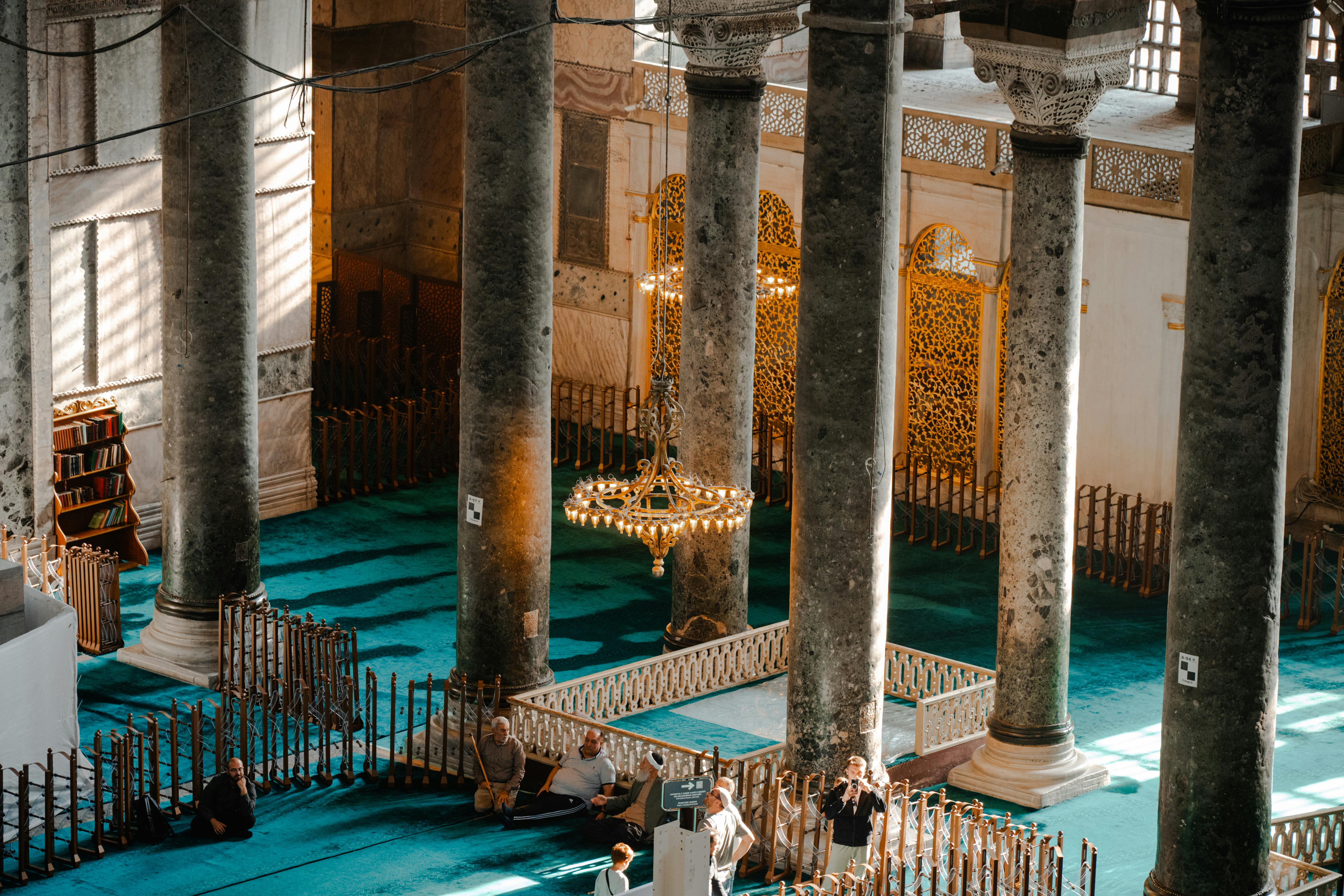 Stunning interior of Hagia Sophia Mosque featuring grand columns and intricate details with natural lighting.
