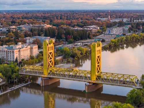 Free A stunning aerial view of the iconic Tower Bridge in Sacramento, California, during sunset. Stock Photo