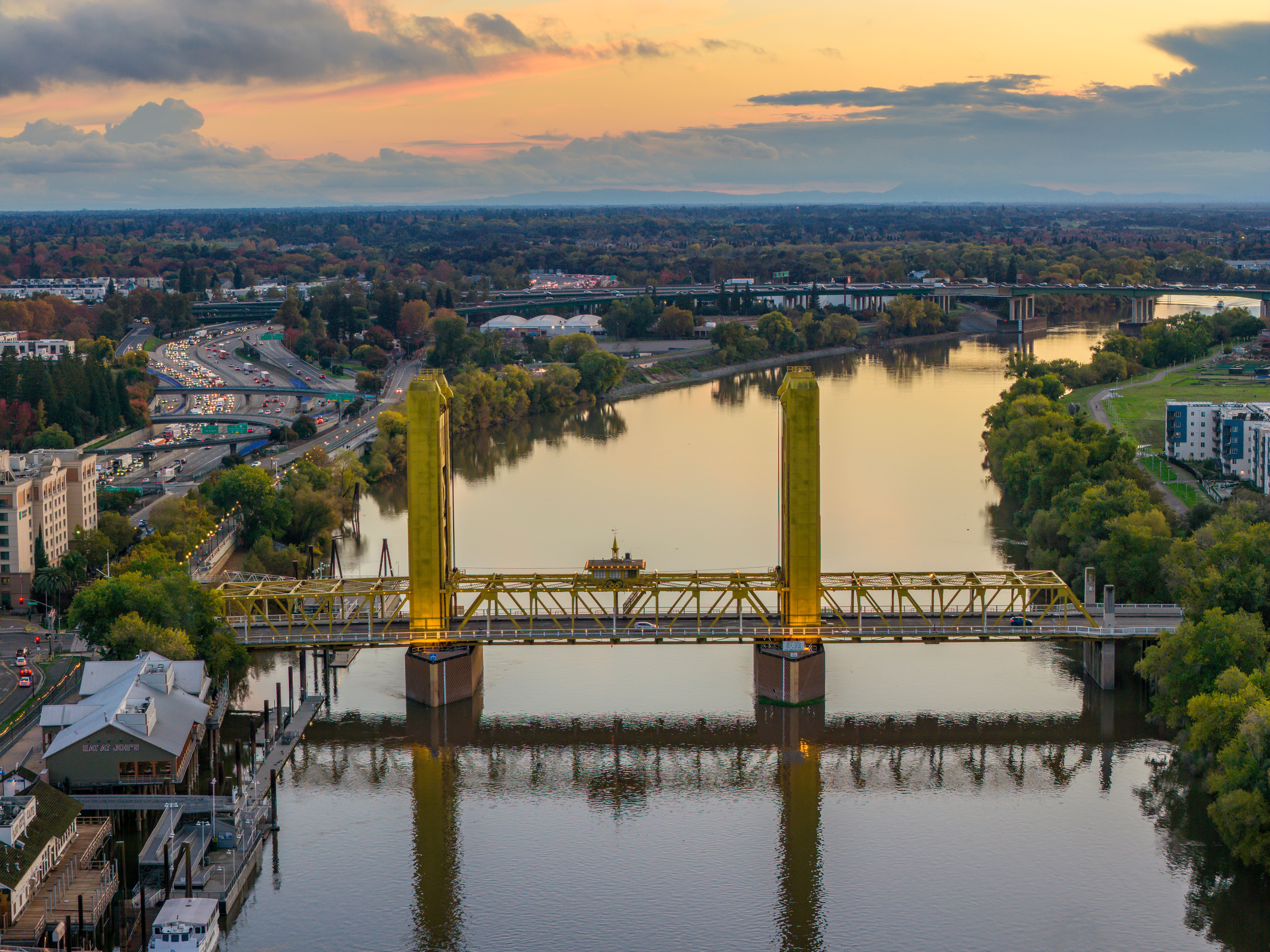 Golden Tower Bridge at Sunset Over Sacramento River · Free Stock Photo