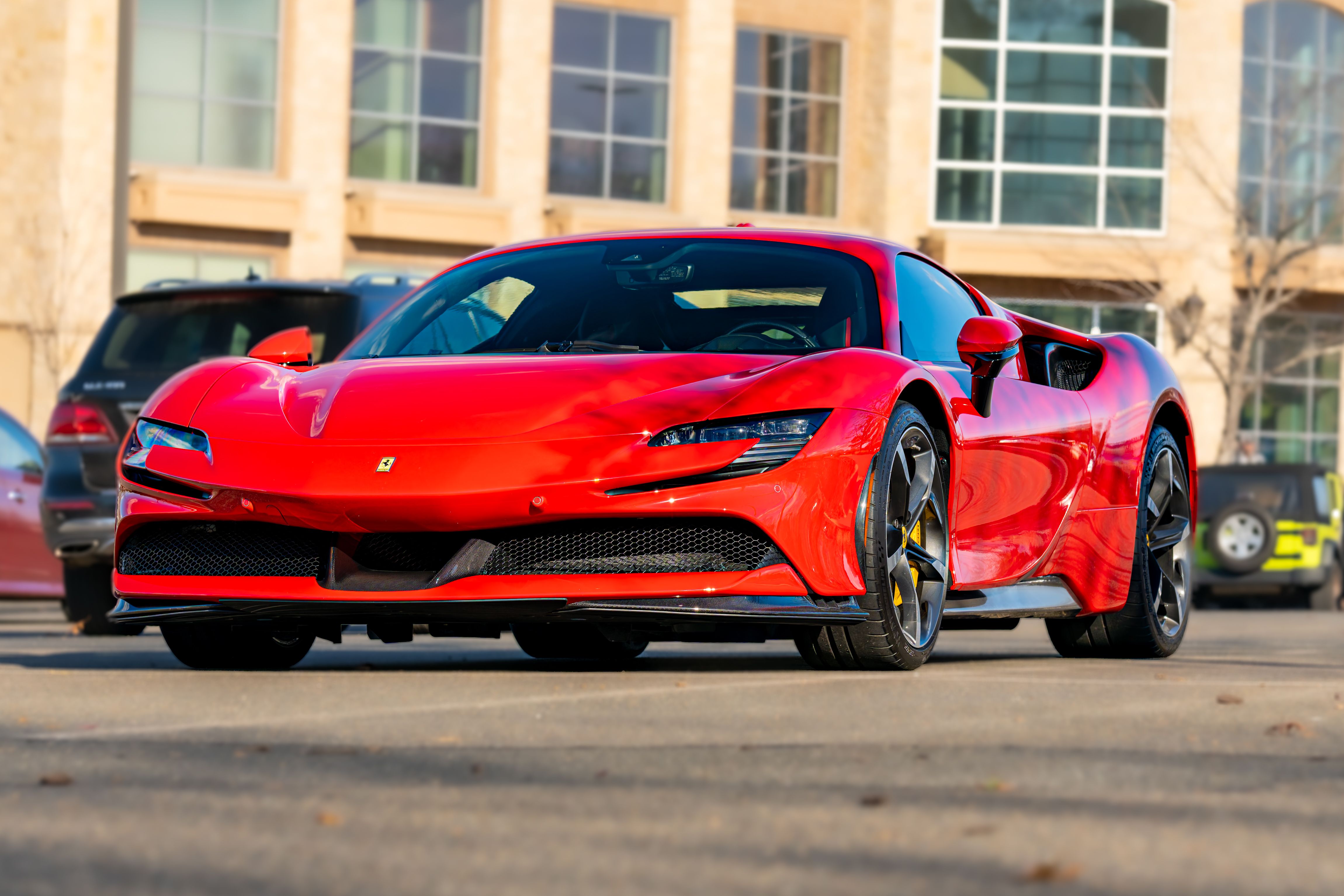 Striking Red Sports Car in Urban Setting · Free Stock Photo