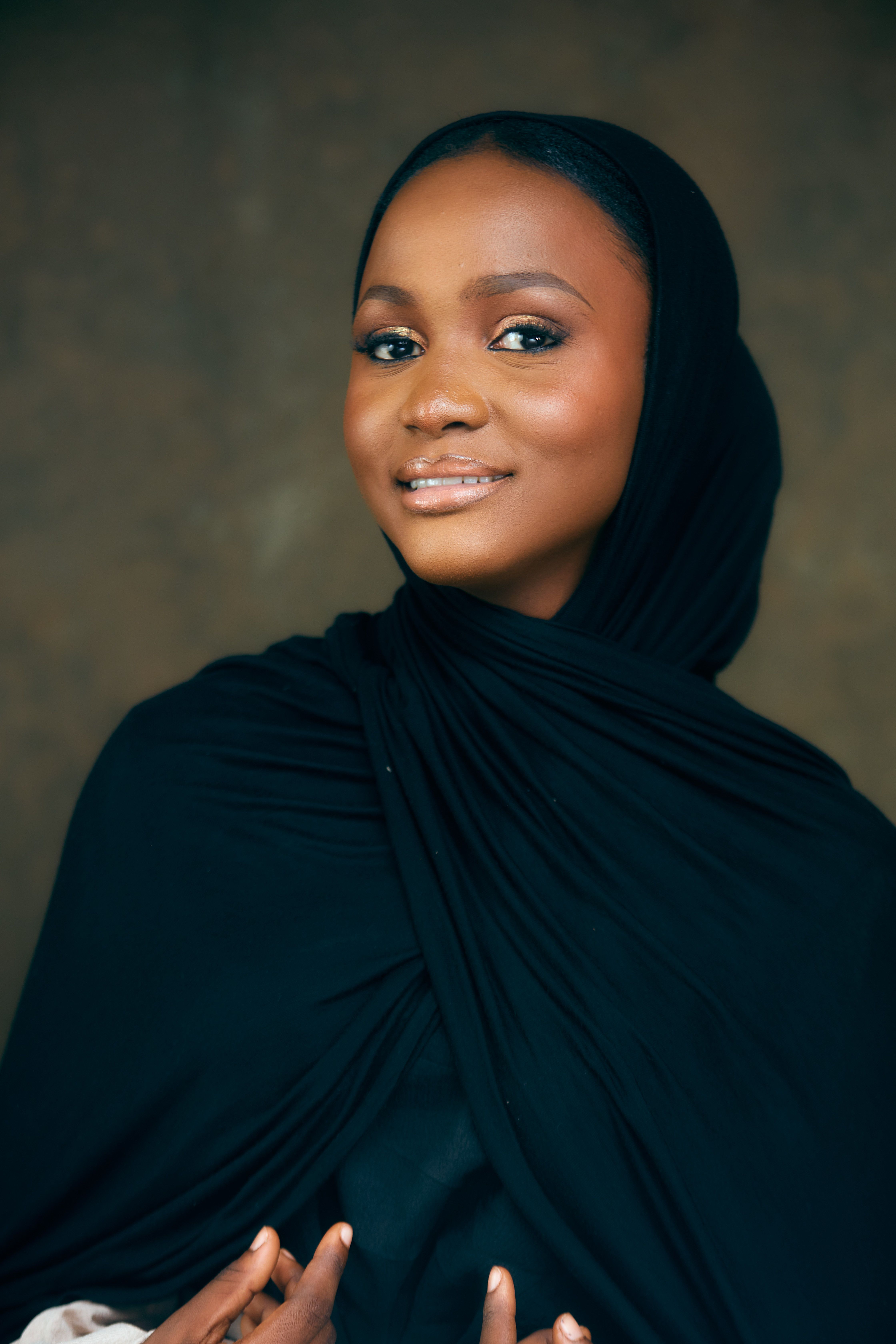Portrait of Smiling Woman in Black Hijab · Free Stock Photo