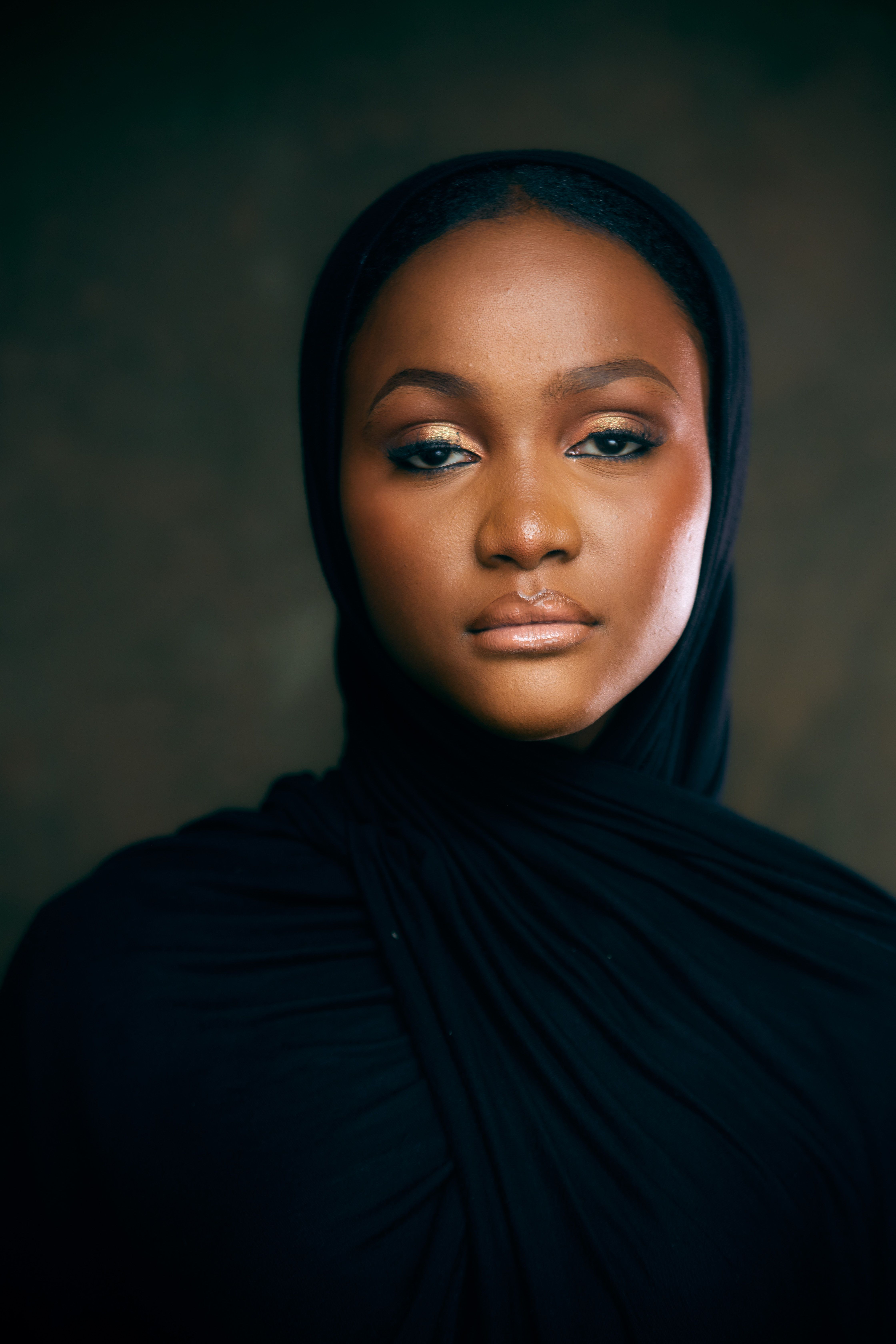 Elegant Portrait of Woman in Black Hijab · Free Stock Photo