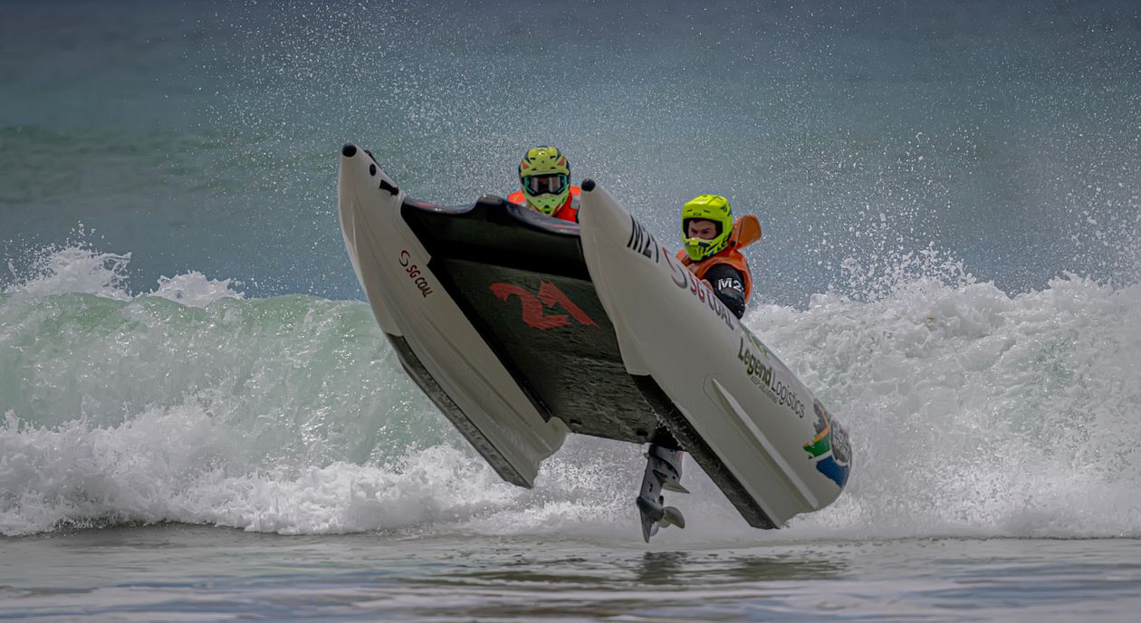 Jet Boat Circle Racing Thrilling Jet Boat Race in Action on Ocean Waves · Free Stock Photo