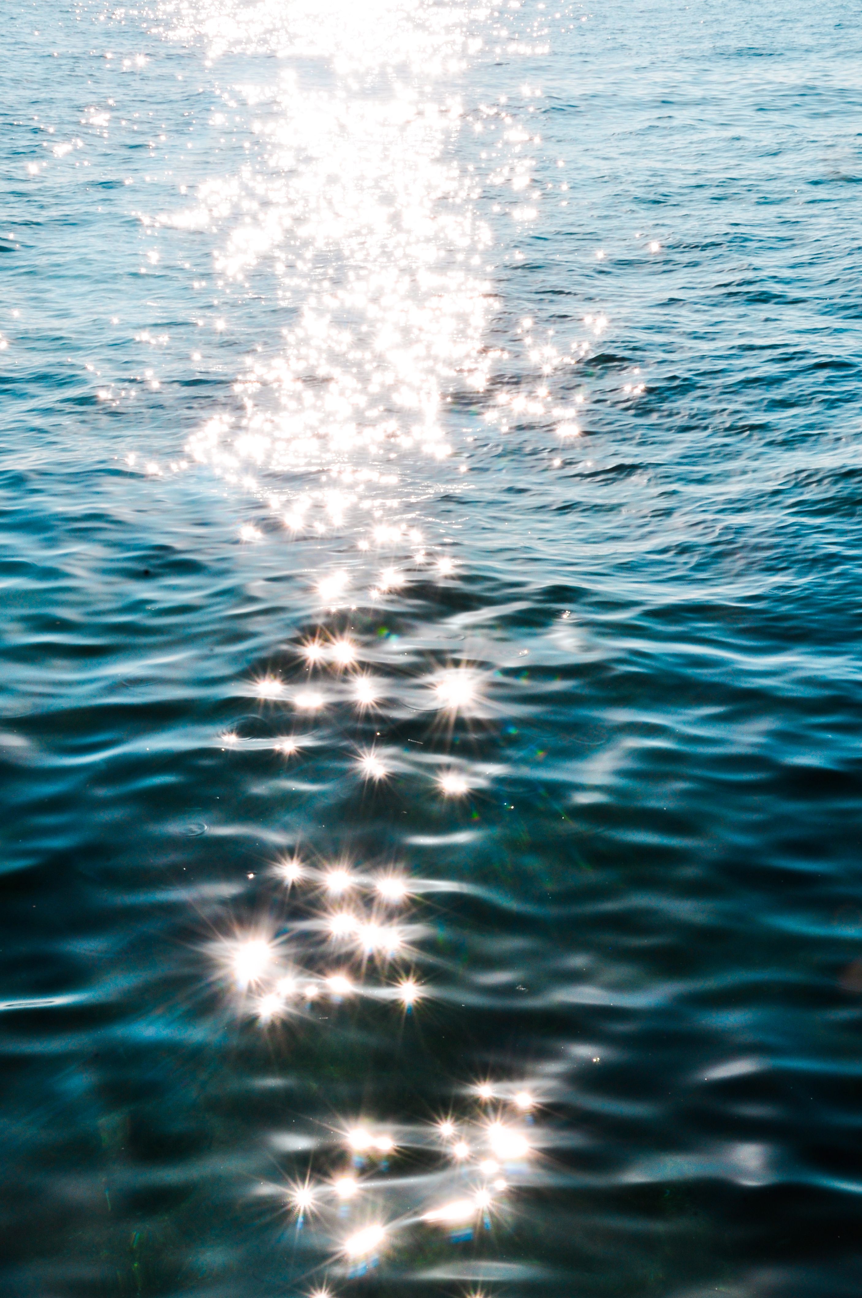 Sparkling Sunlight on Ocean Waves · Free Stock Photo