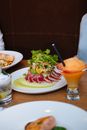 Restaurant dishes with drinks on table