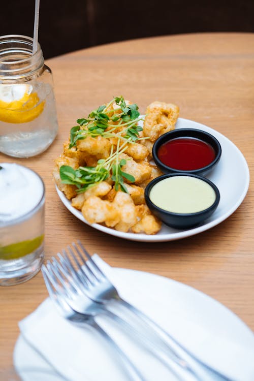 Free Calamares With Ketchup and Mayonnaise Dip Stock Photo