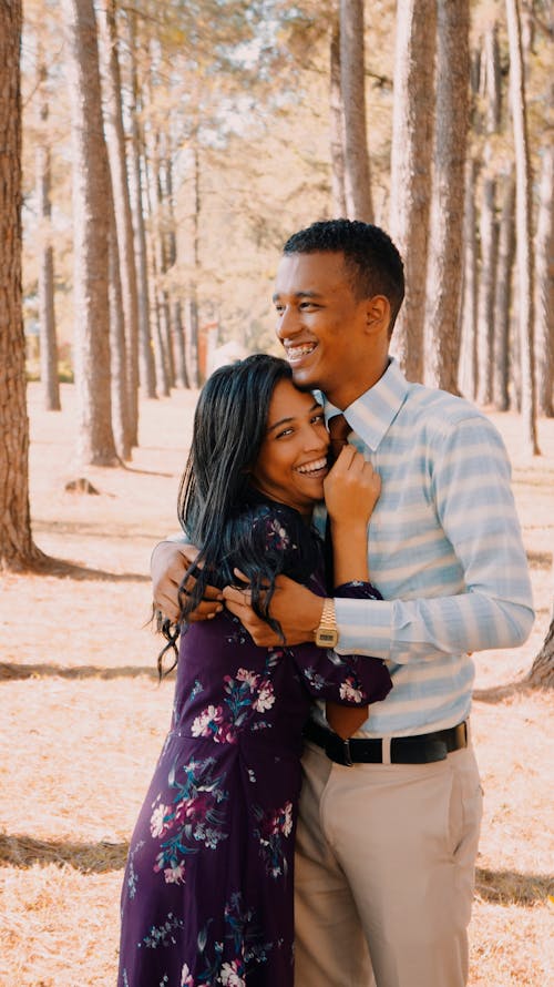 Free Man Embracing His Girlfriend Stock Photo