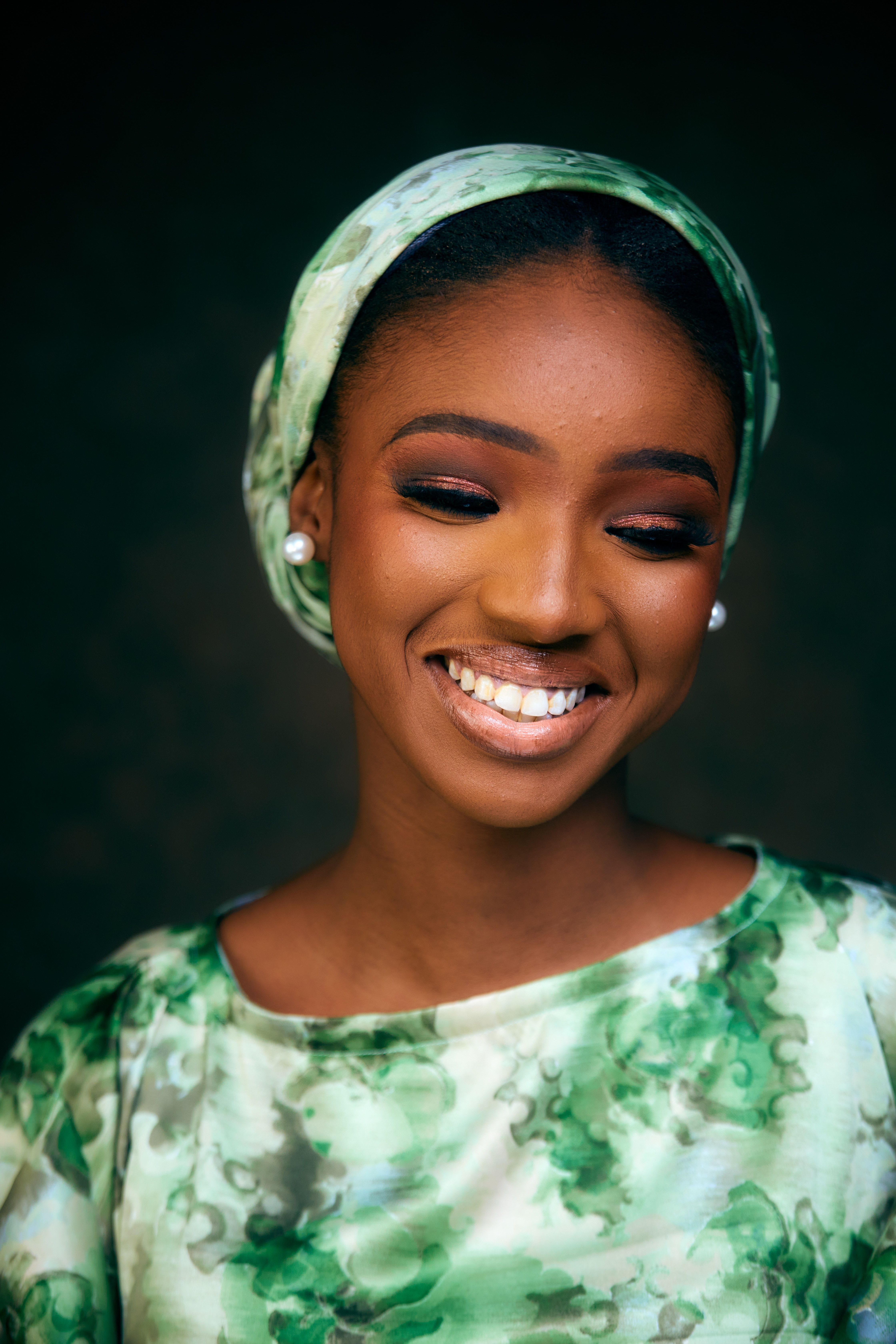 Portrait of Woman in Green Traditional Headscarf · Free Stock Photo