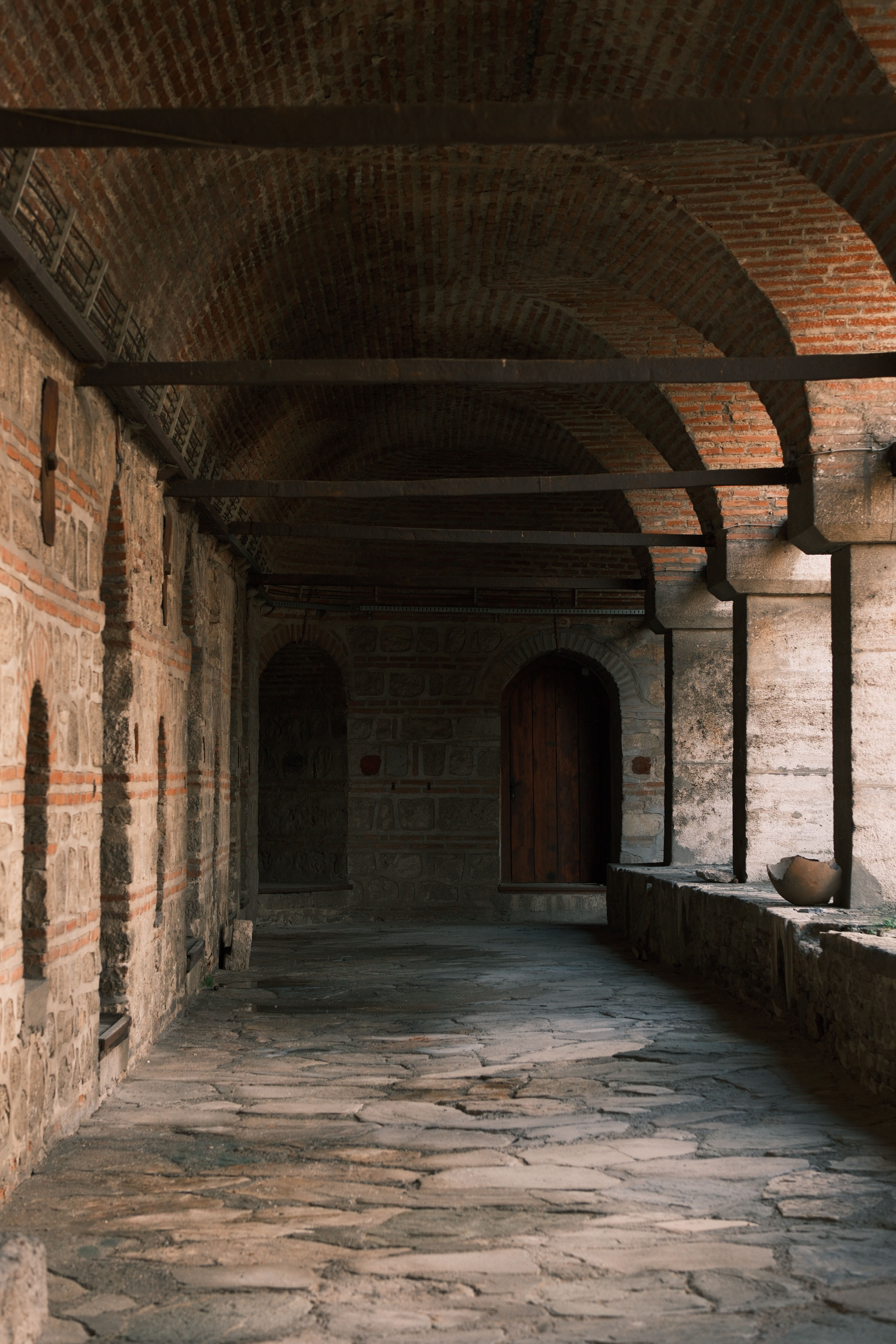 Historic Stone Corridor with Arched Ceilings · Free Stock Photo