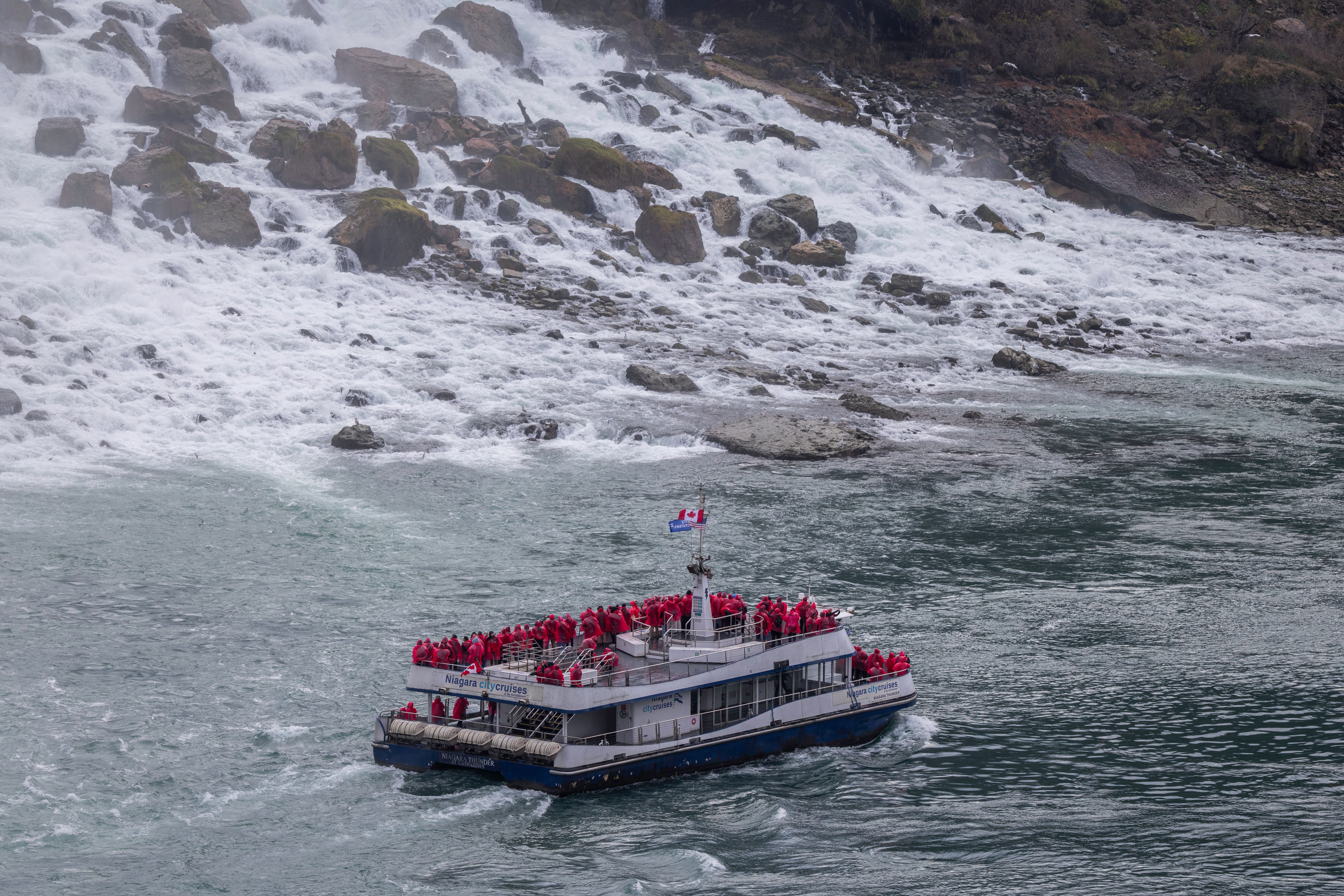 Hornblower Niagara Cruises boat approaching Niagara Falls in Canada