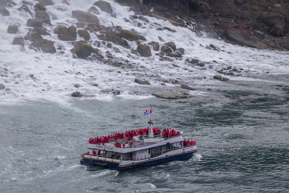 Hornblower Niagara Cruises boat approaching Niagara Falls in Canada