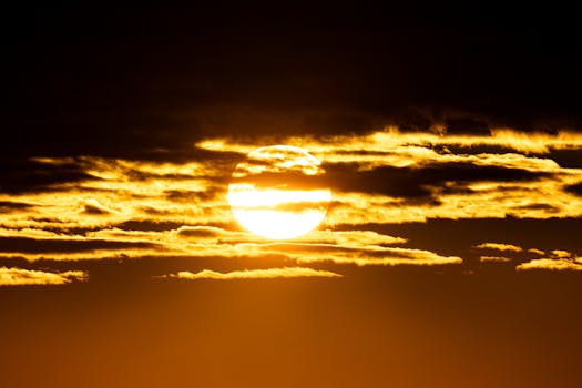 Captivating sunrise over Stamford, Connecticut with golden clouds and vibrant lighting.