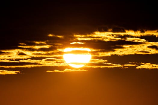 Stunning view of a vibrant sunrise over Stamford, Connecticut, casting warm autumn colors across the sky.