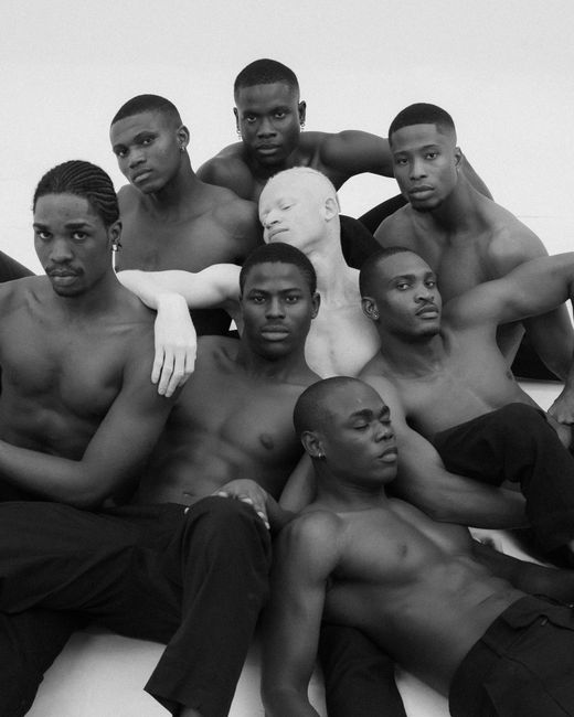 Artistic black and white portrait of diverse adult men in Lagos, Nigeria.