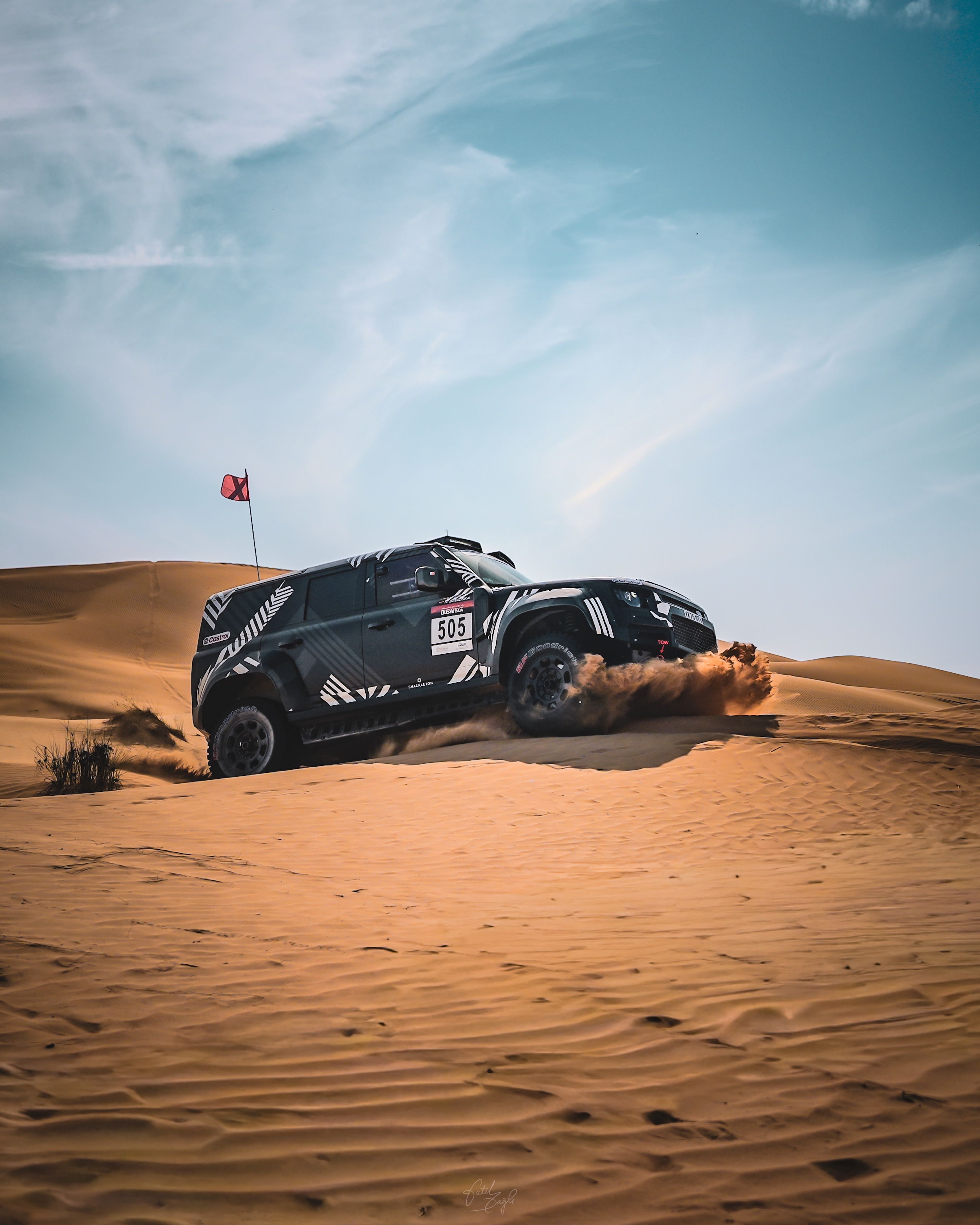 Rally Car Racing Through Desert Landscape · Free Stock Photo