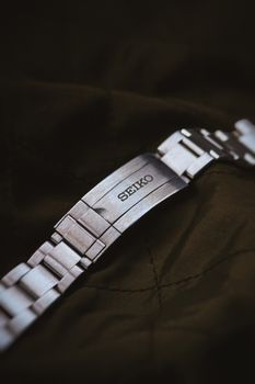 A close-up of the Grand Seiko SBGW325 dial showing its intricate texture and ideal SBGW325 wrist size proportions.