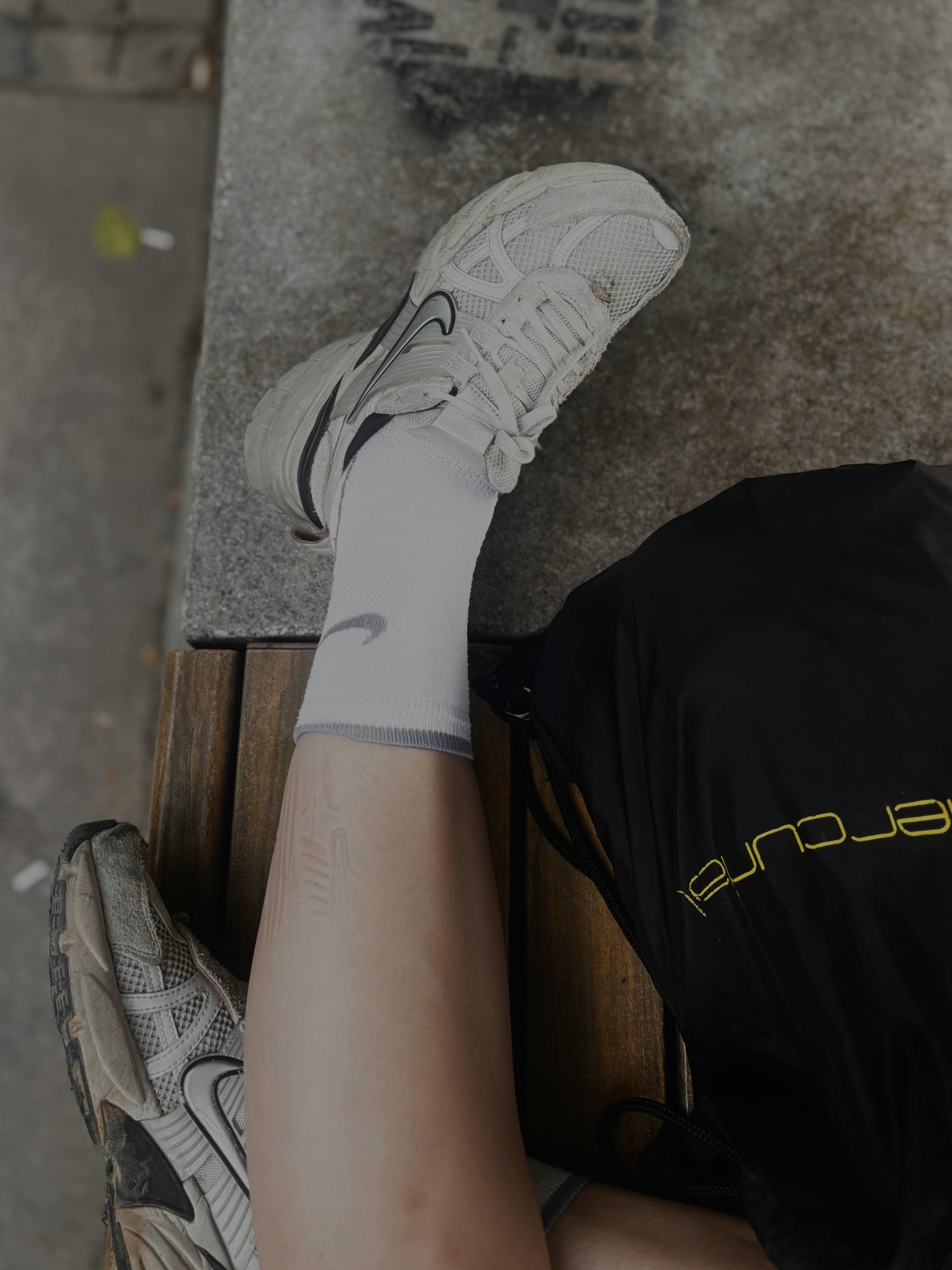 girl wearing nike socks