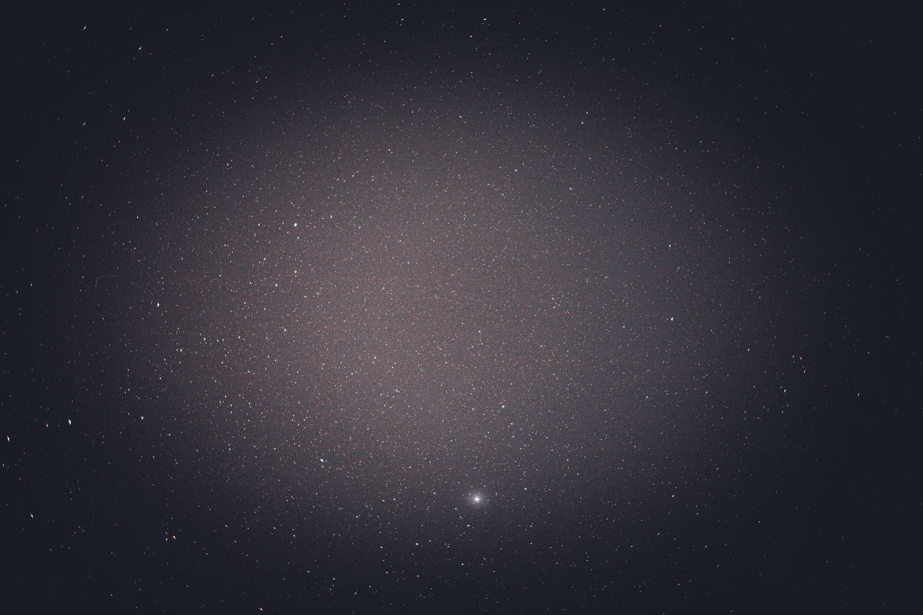 A breathtaking view of a starry night sky featuring a dense cluster of stars in the cosmos.