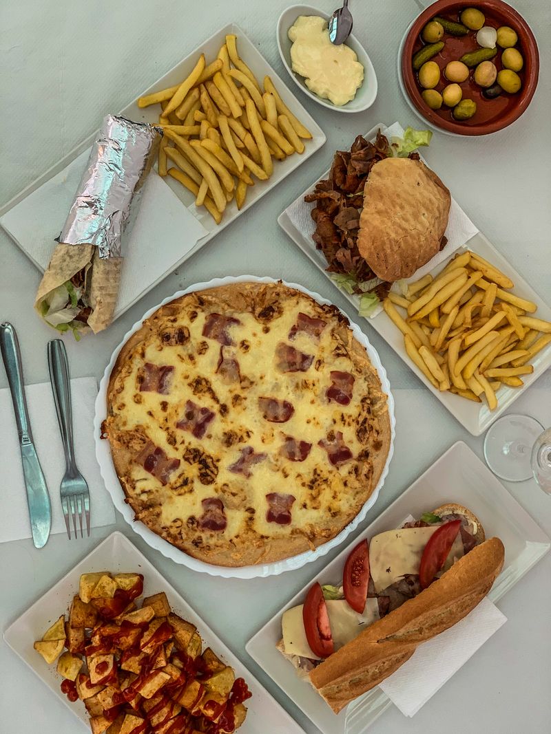 Special #2: X-Large Plain Pizza, 2 Cheesesteaks, French Fries & 2 Liter Soda