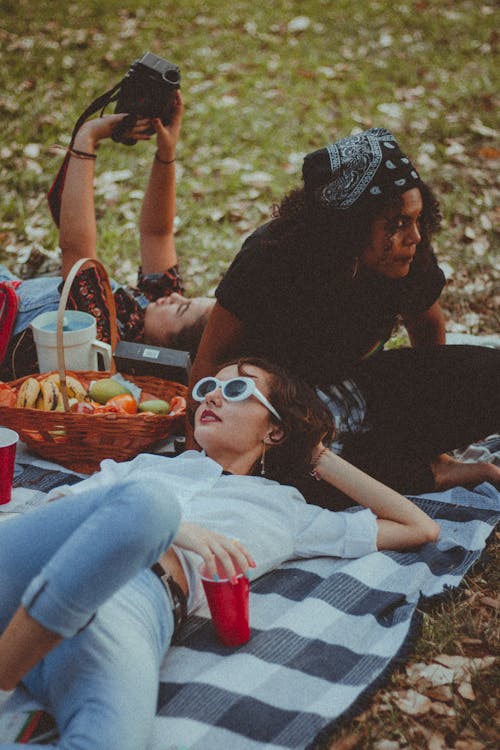 Free Three Women Having a Picnic Stock Photo