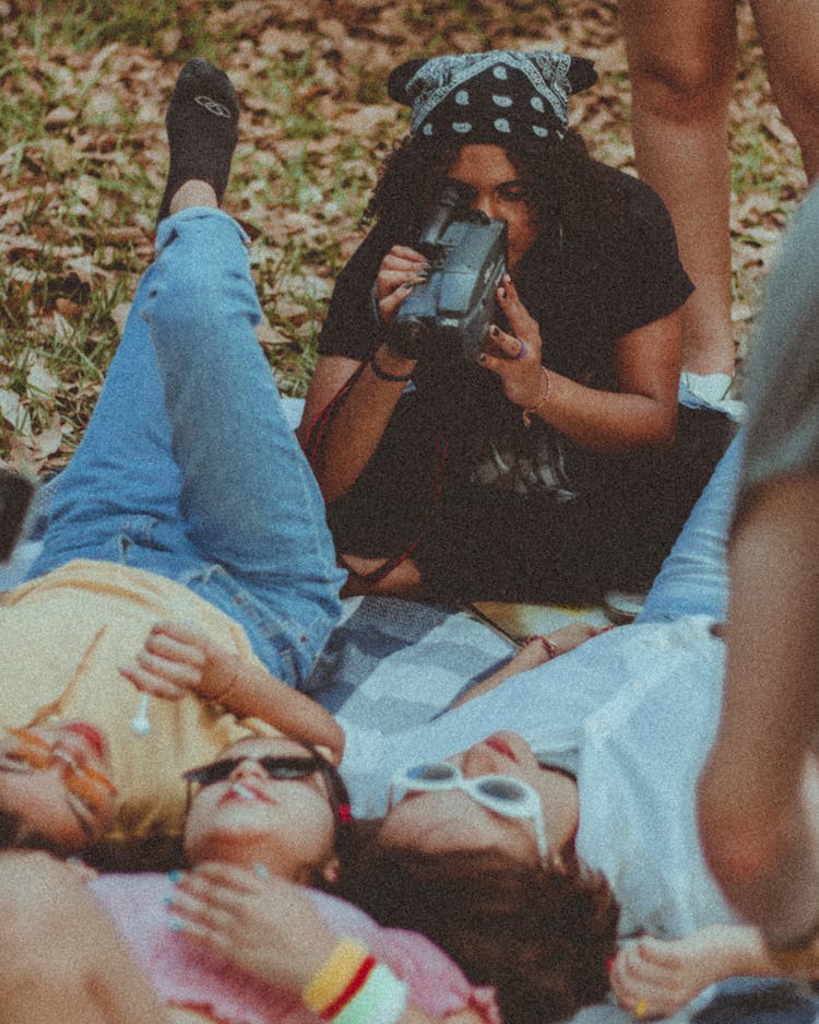 Woman Holding Camera