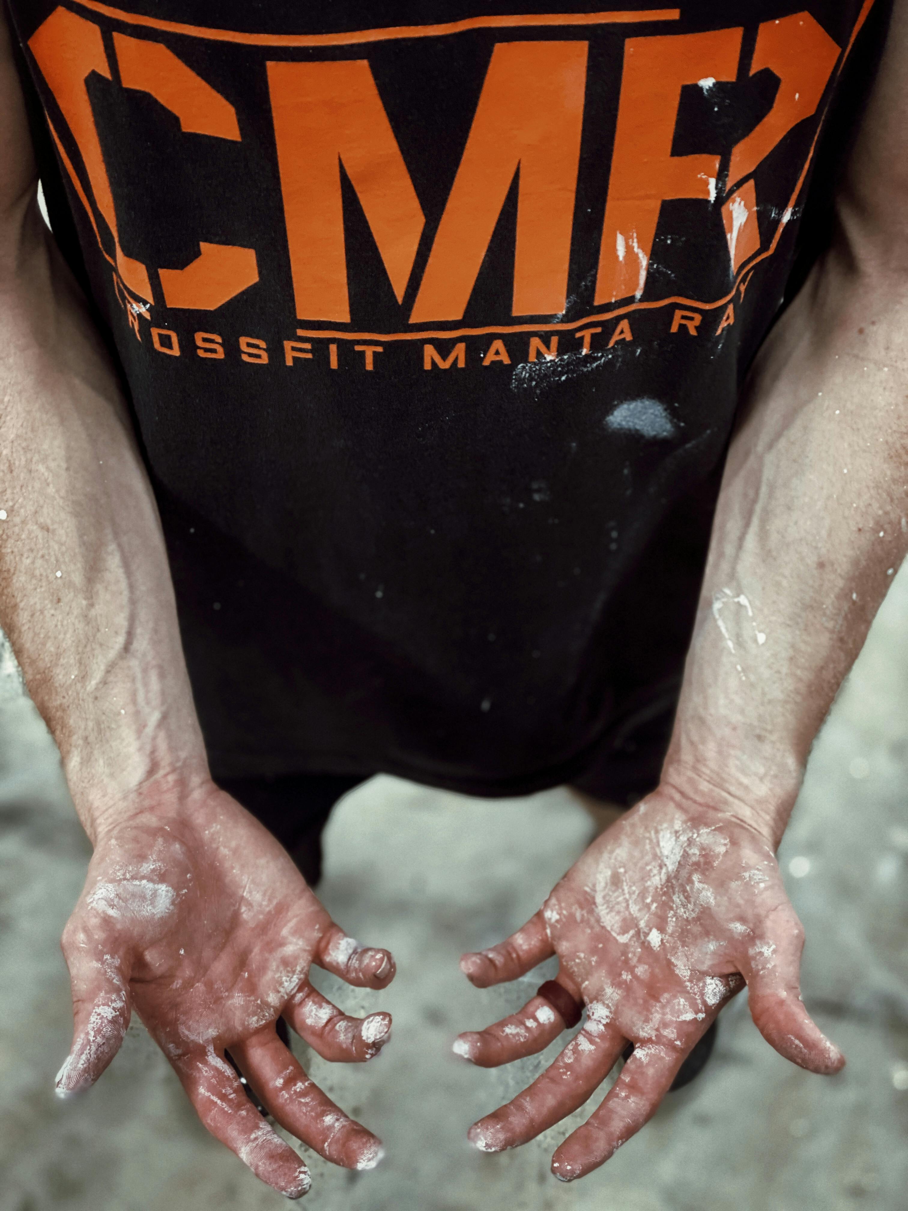 Man in Black and Orange Crew Neck T-shirt