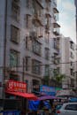 Urban Asian Street with Market Stalls and Apartments