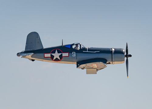 Free Vintage Vought F4U Corsair flying at low altitude during an airshow in San Diego. Stock Photo