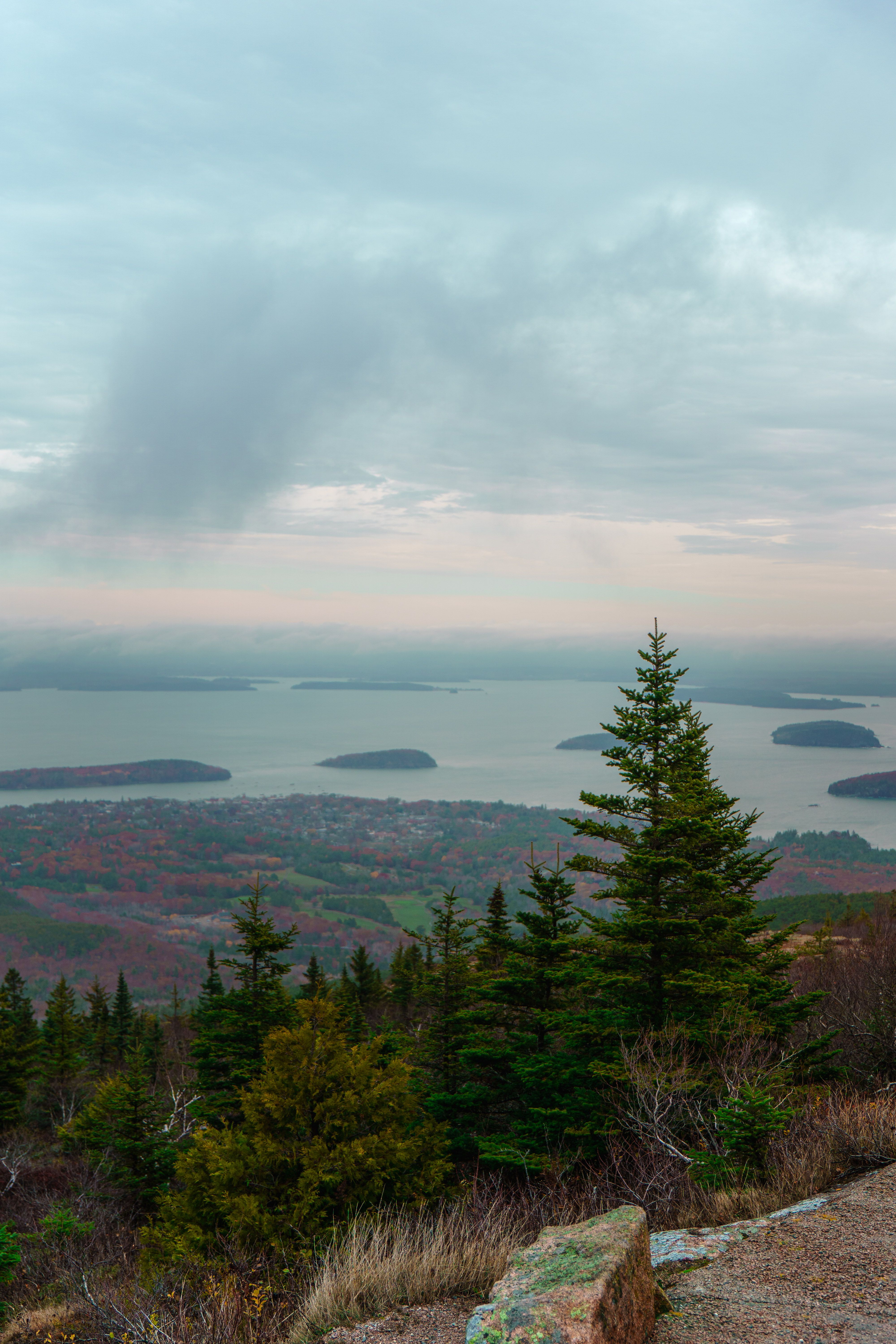 Sunrise light over Cadillac Mountain summit road with coastal views in Acadia National Park