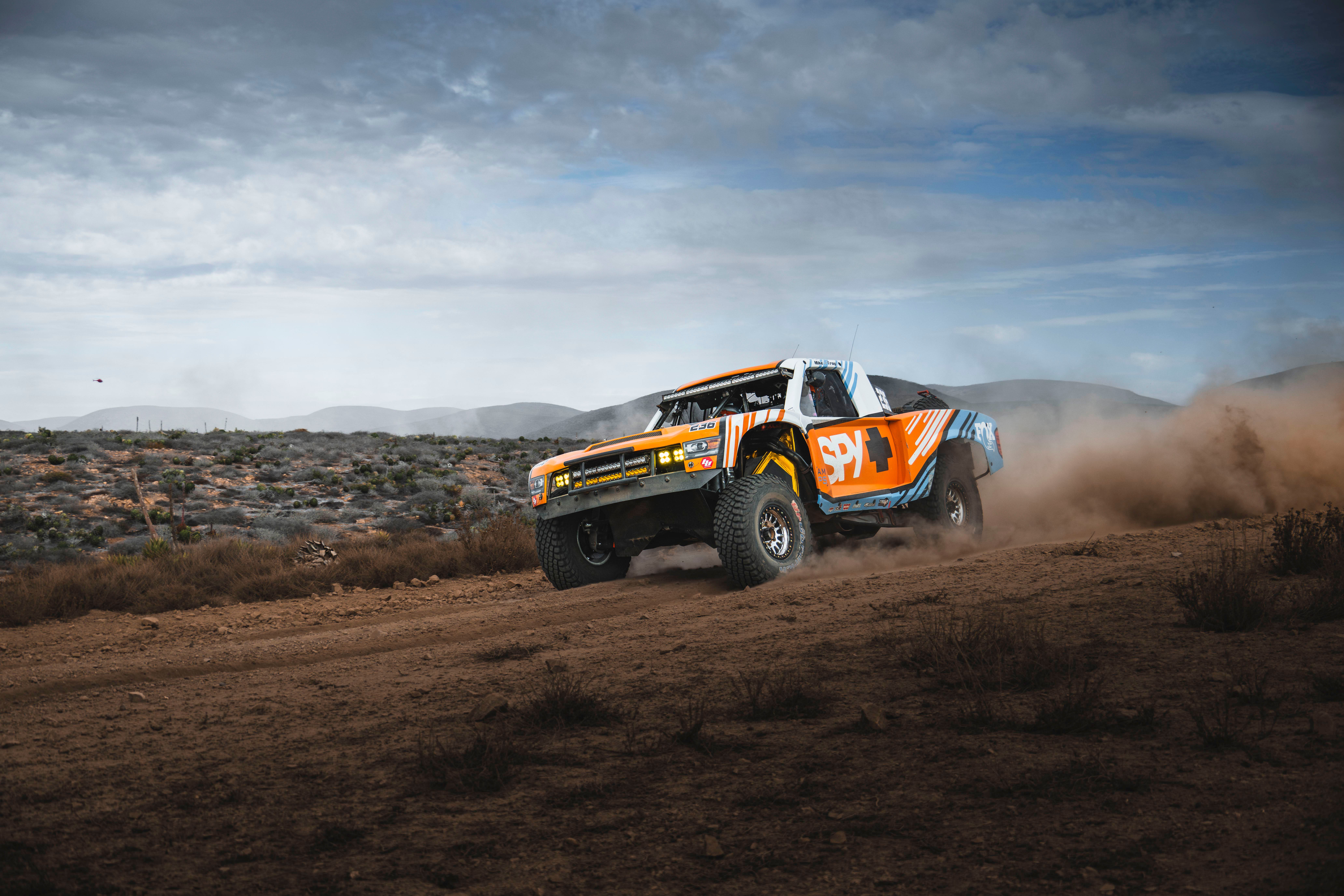 Dynamic Off-Road Racing in Baja Desert Action · Free Stock Photo