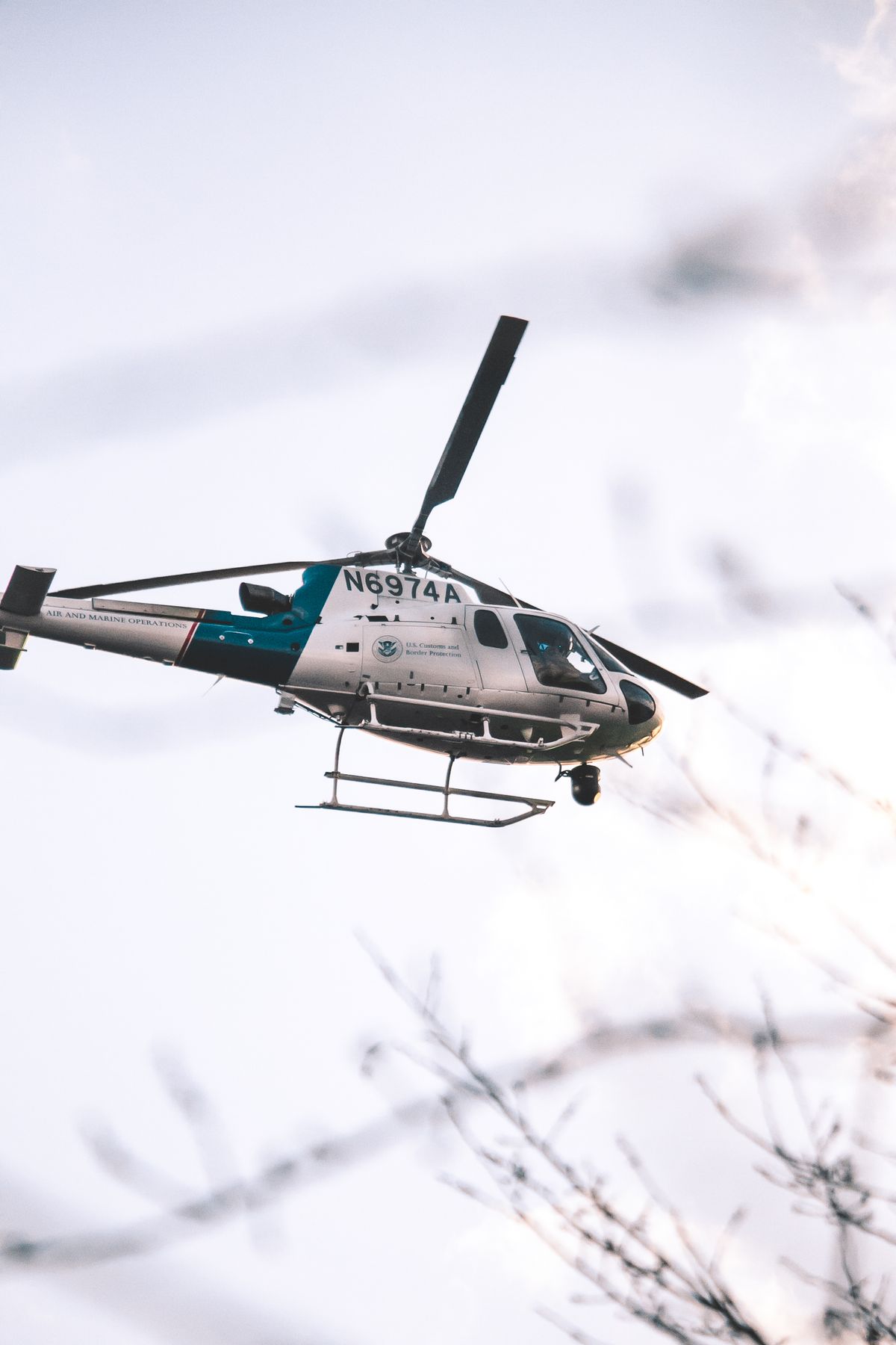 Helicopter flying in the sky — under the FAA radar separation for helicopters mandate, helicopter operators face delays and rerouting at Class B, C, and TRSA airports
