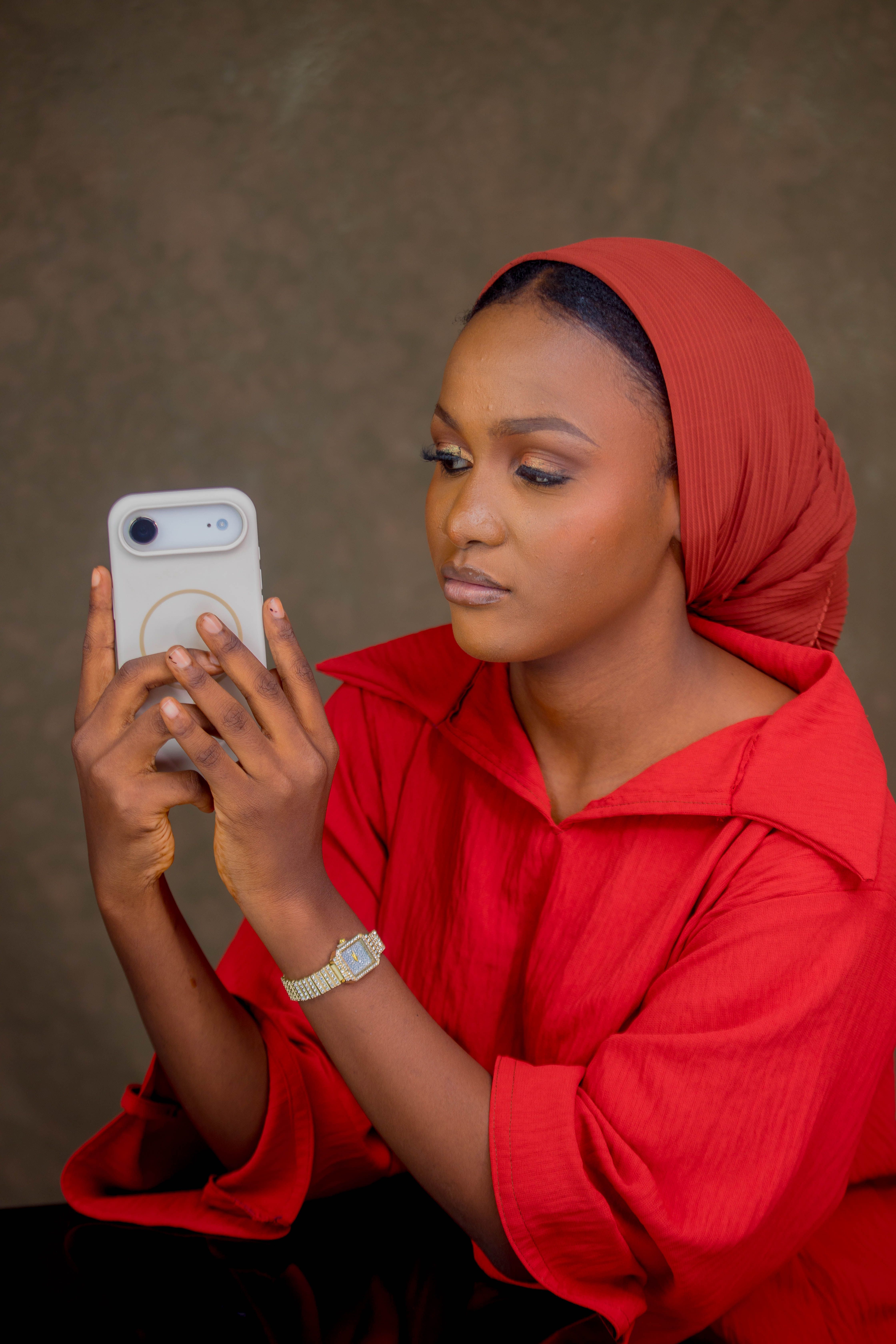 Woman in Red Hijab Using Smartphone · Free Stock Photo