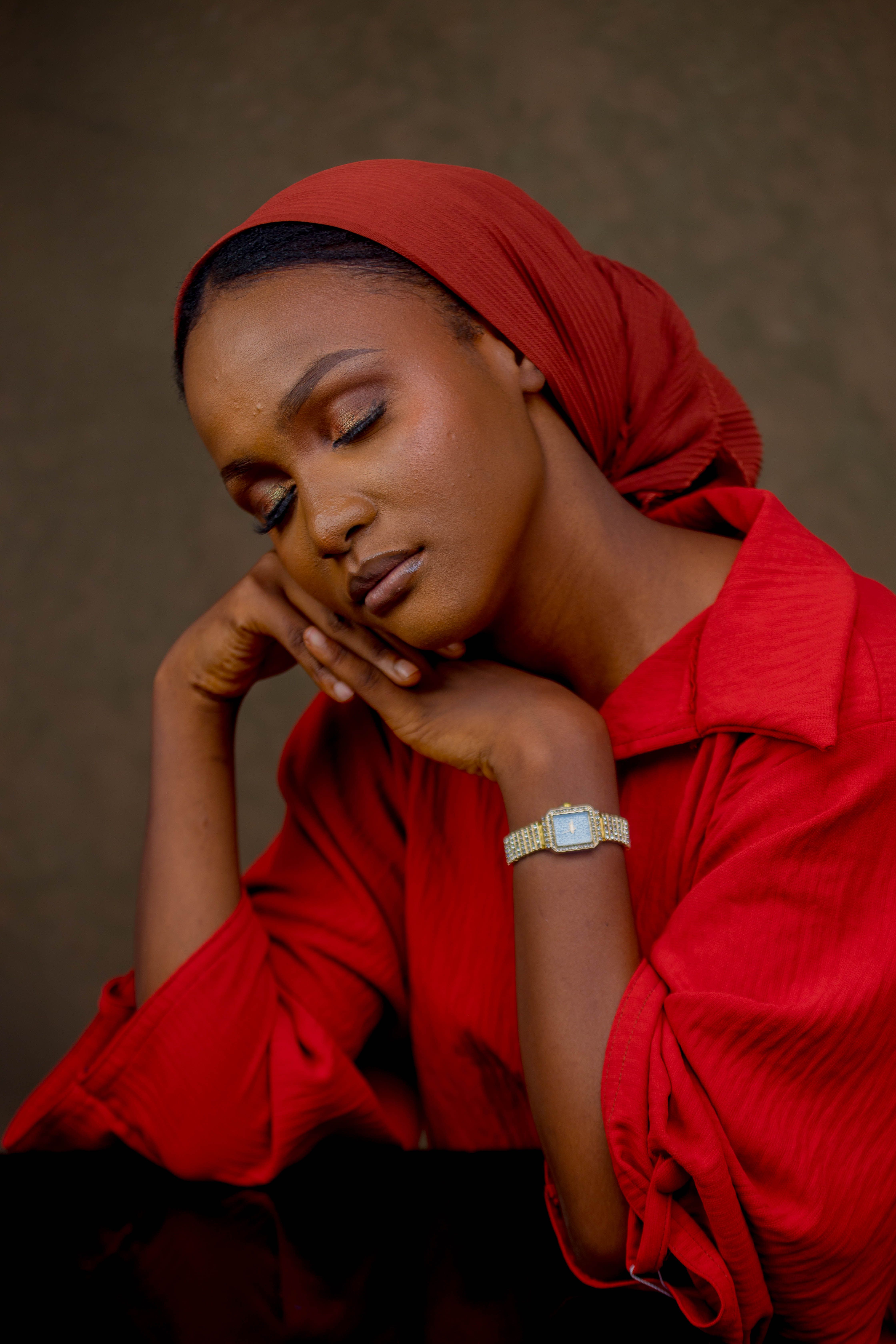 Elegant Portrait of a Woman in Red with Headscarf · Free Stock Photo