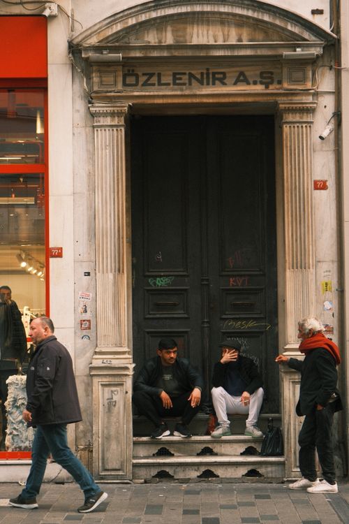 Free Street view in İstanbul with local architecture and people in casual interaction. Stock Photo