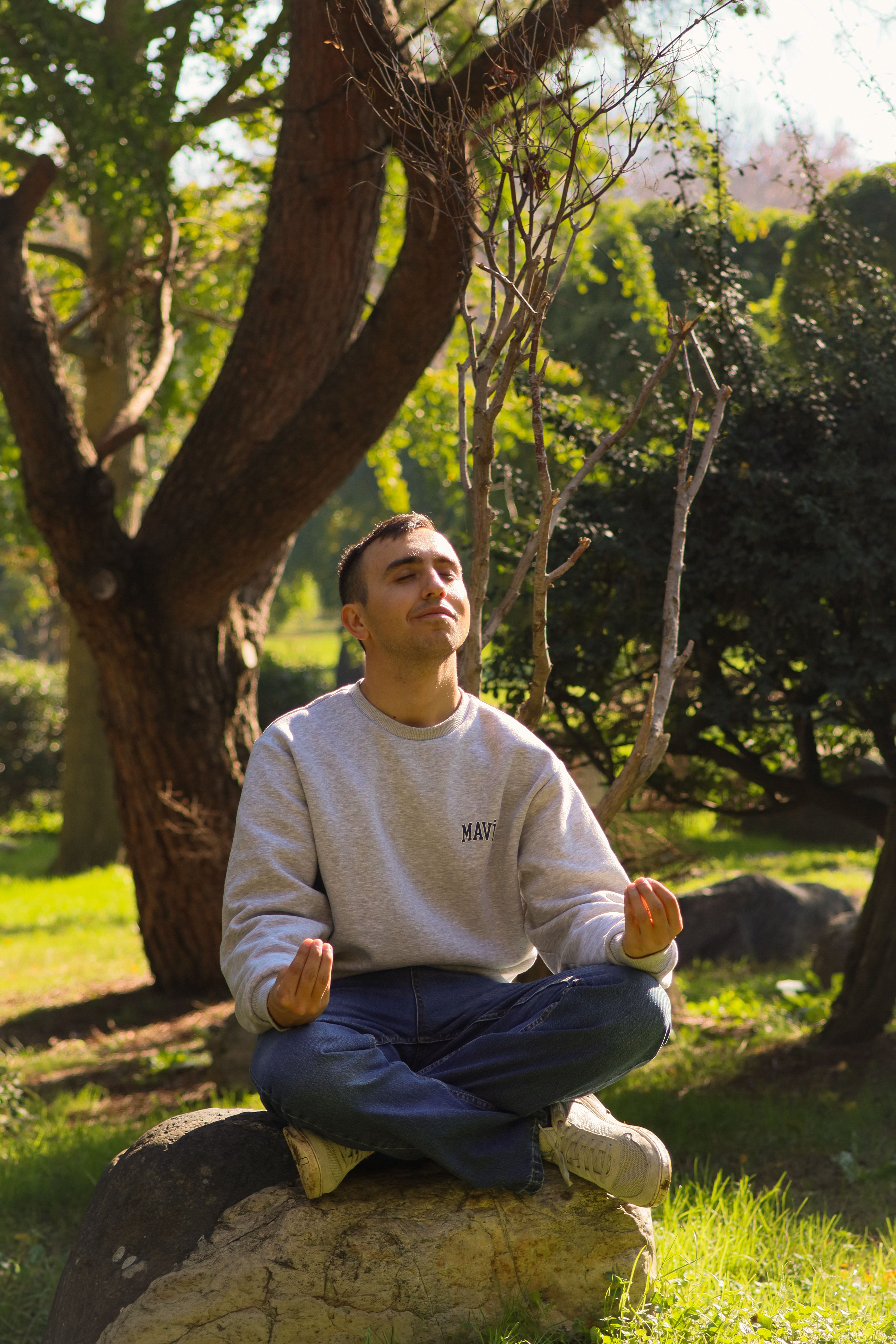 Man Meditating Outdoors in Bursa Park · Free Stock Photo