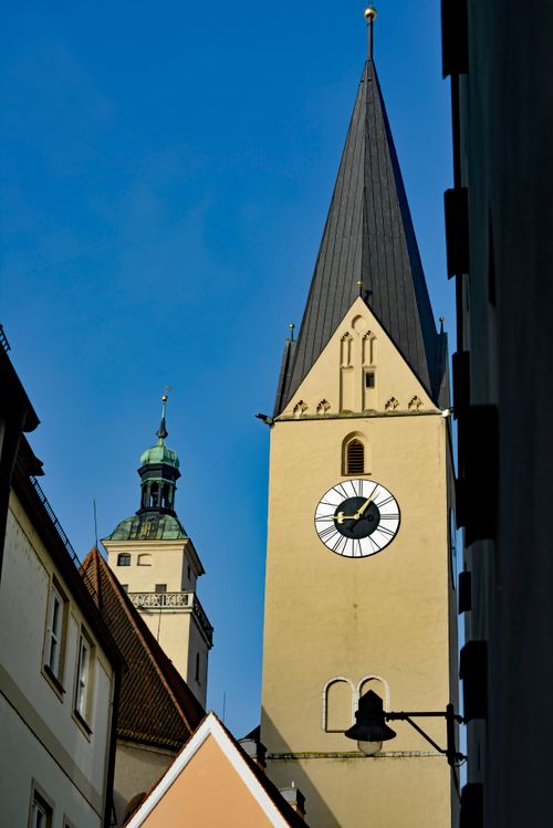 Free Iconic church towers against a blue sky in Ingolstadt, Germany. Stock Photo