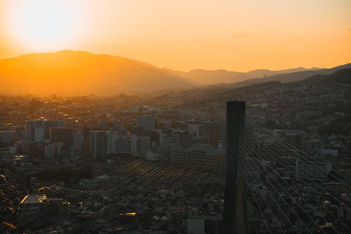 Free A beautiful sunset over the skyline of Ikeda, Osaka, Japan, highlighting cityscape and mountains. Stock Photo