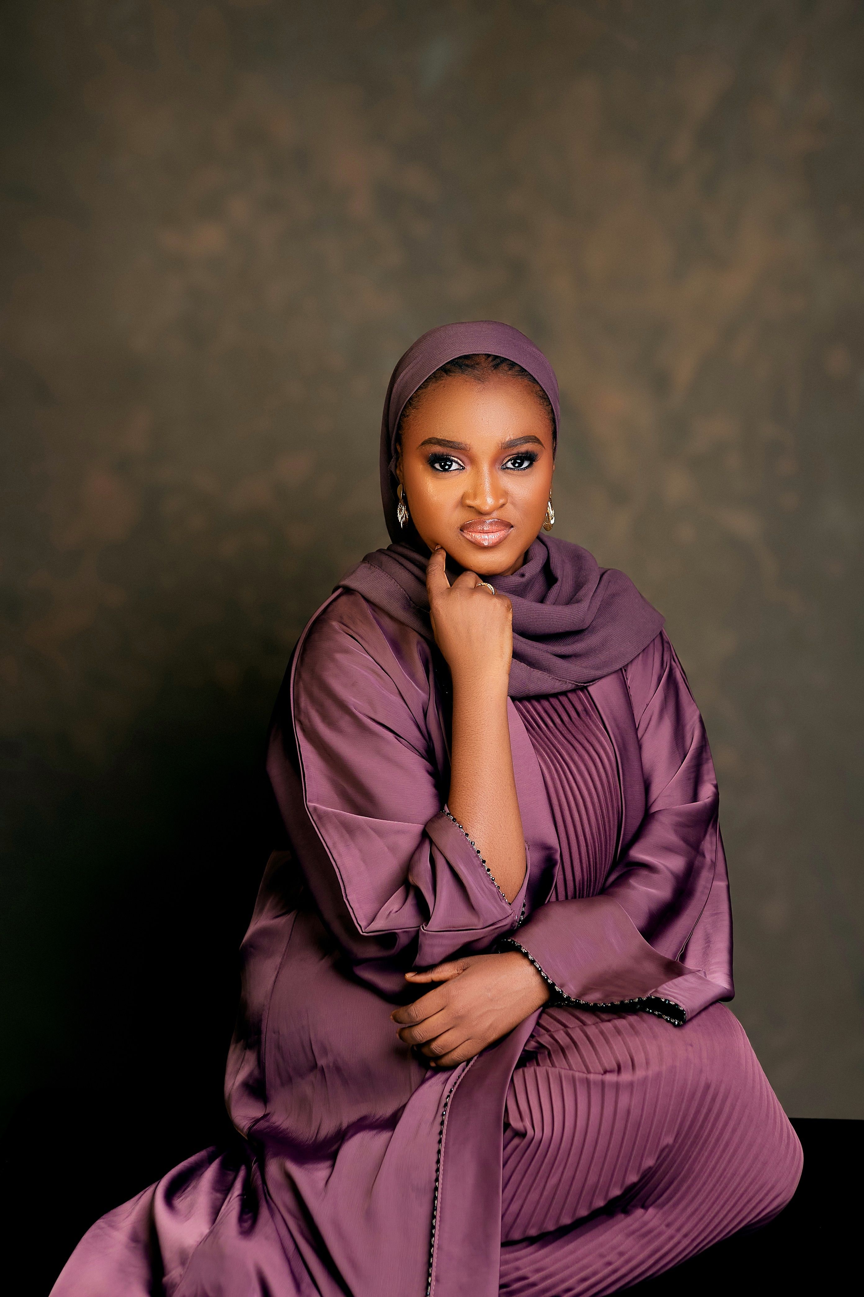 Elegant Portrait of Woman in Purple Hijab · Free Stock Photo