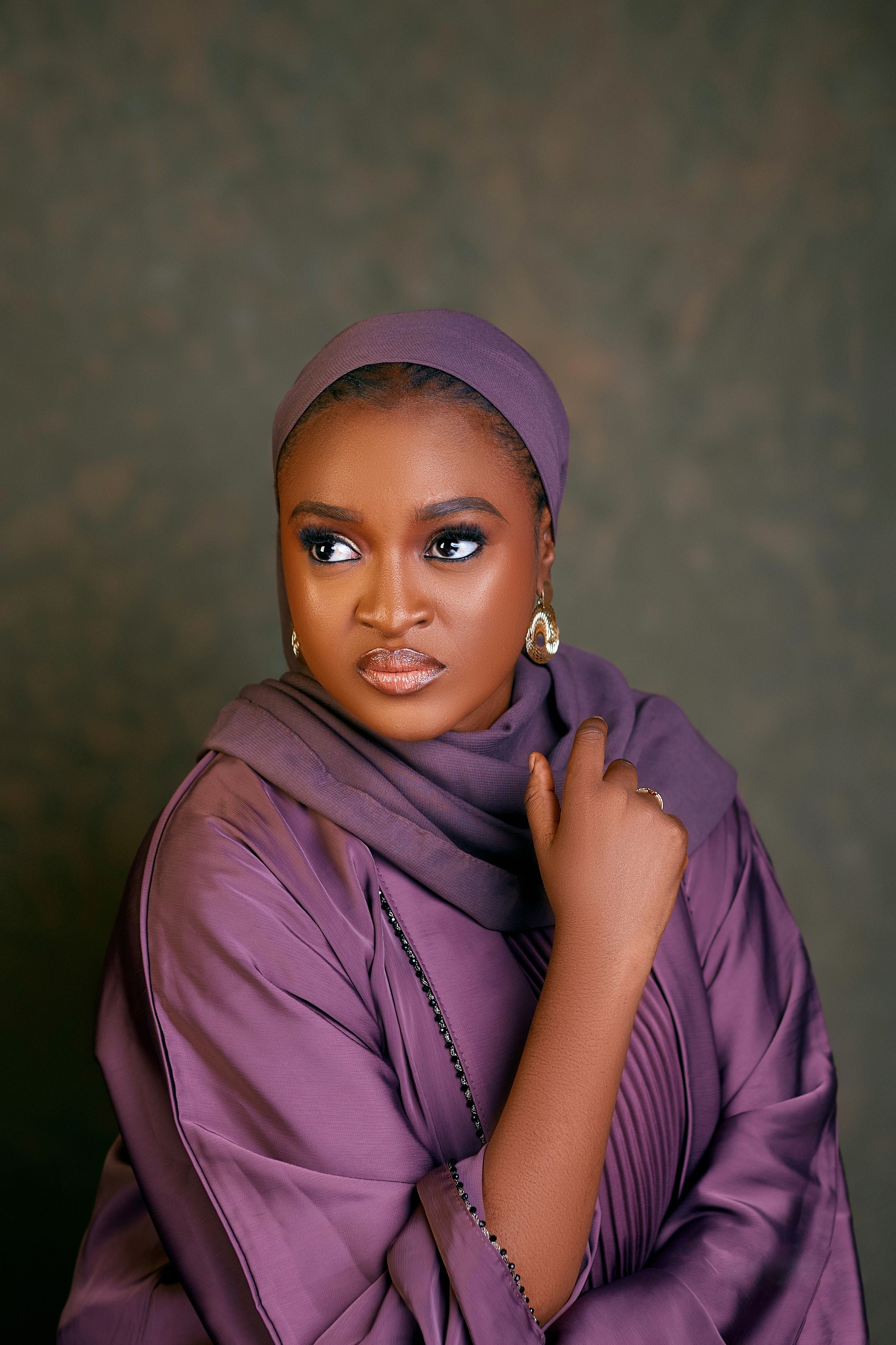 Elegant Portrait of Woman in Purple Hijab · Free Stock Photo