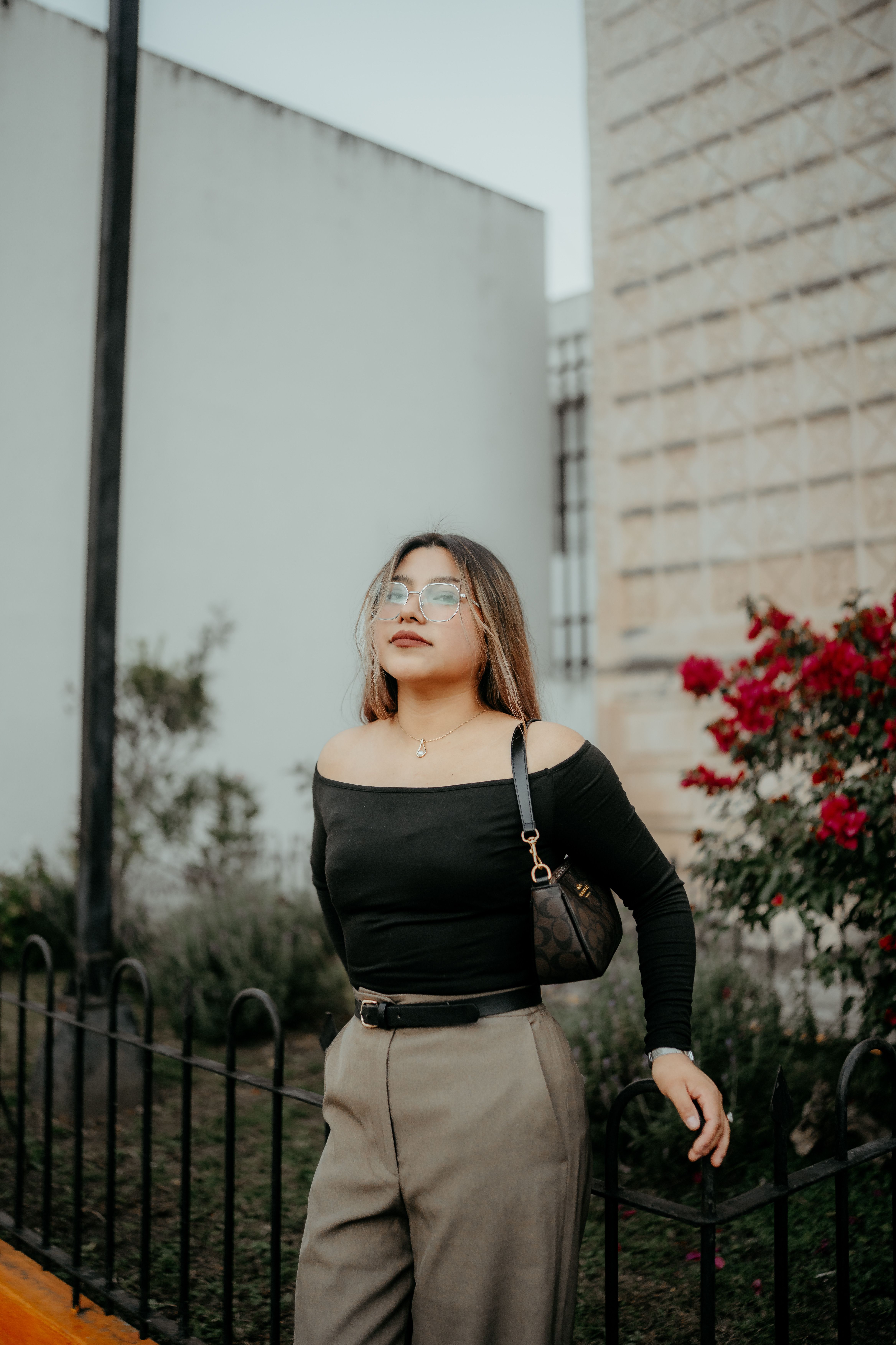 Fashionable woman posing in San Cristóbal de las Casas, Mexico, outdoors.