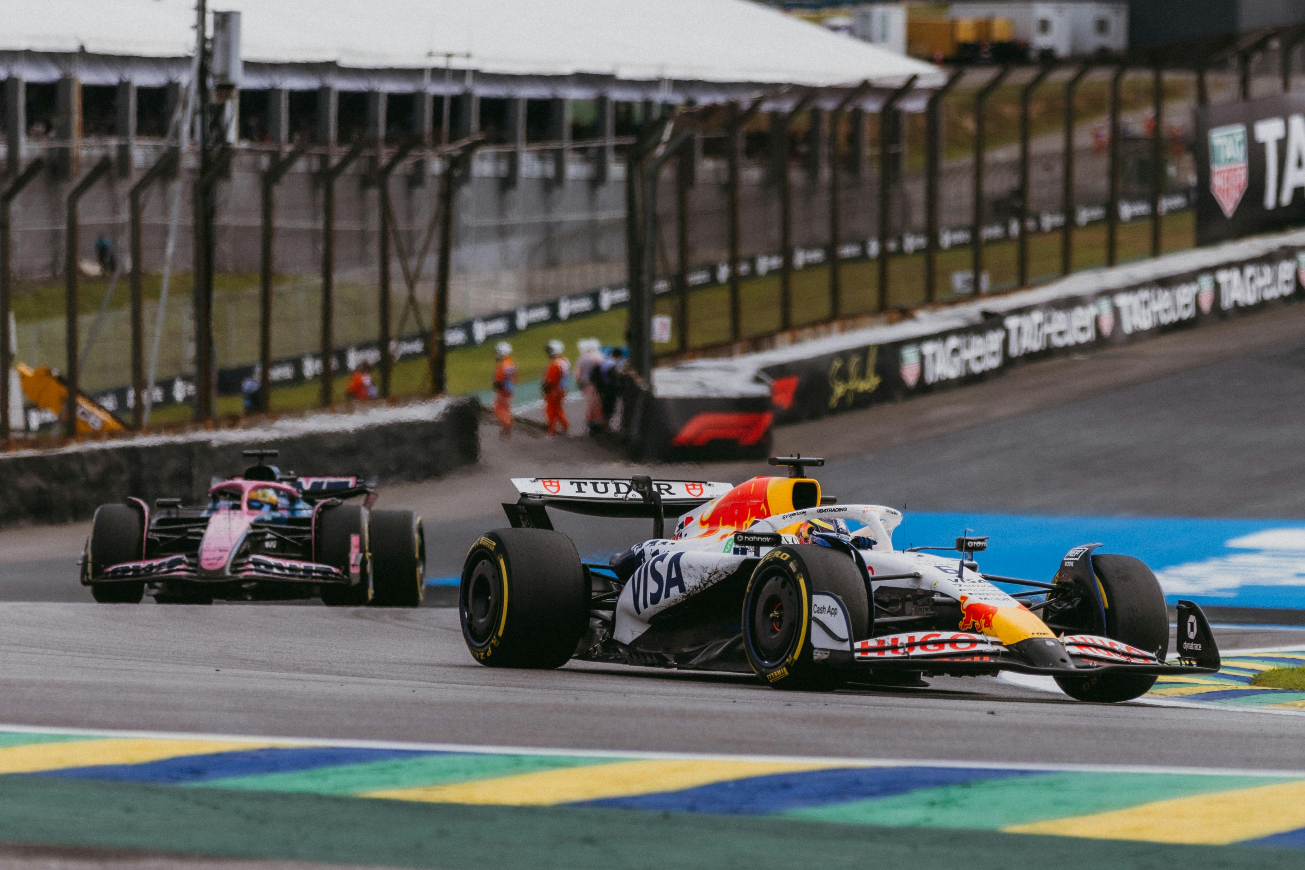 Exciting Formula 1 action with red bull cars racing in S&atilde;o Paulo, Brazil.