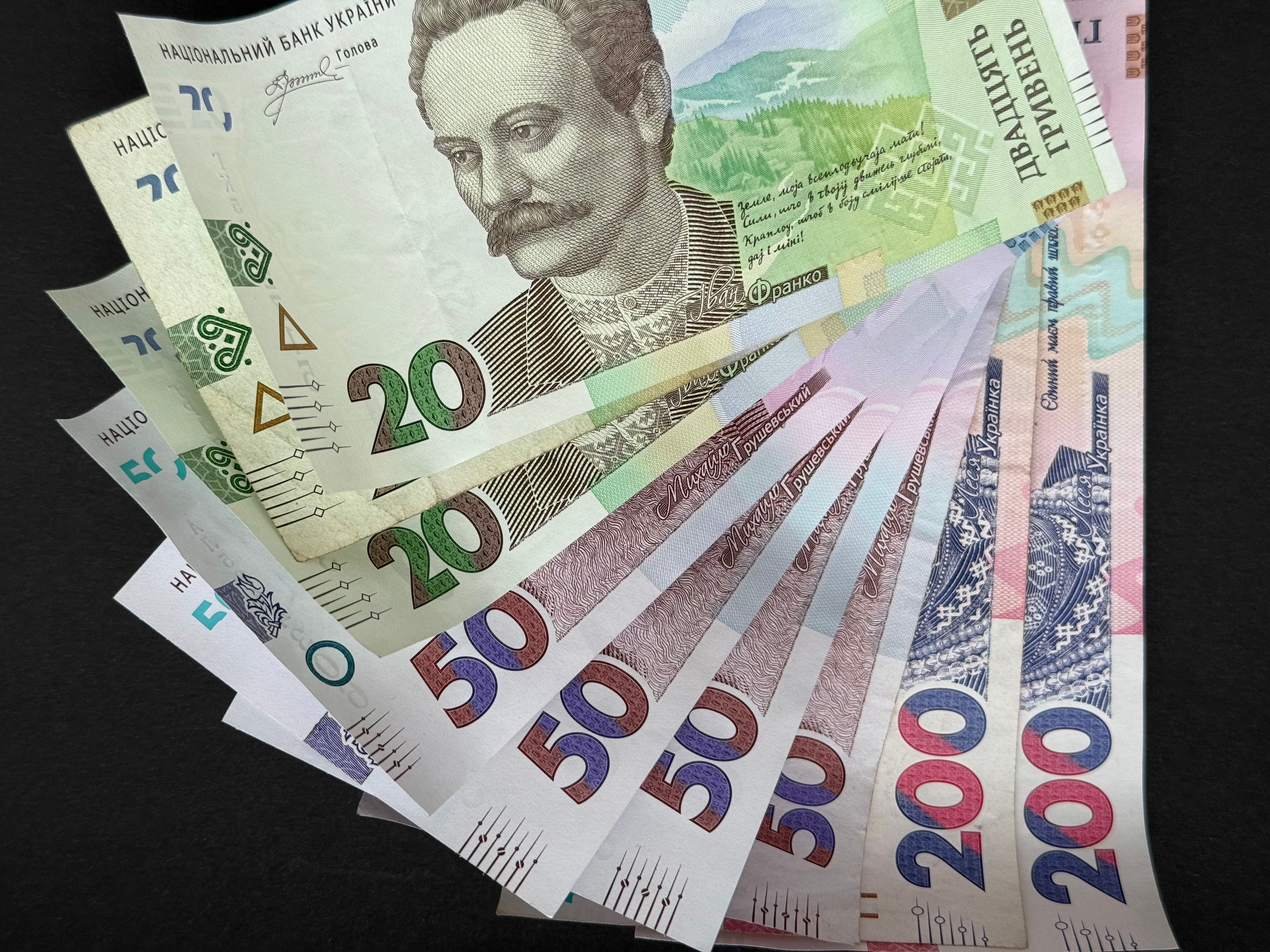 Colorful Ukrainian Hryvnia Banknotes Spread · Free Stock Photo