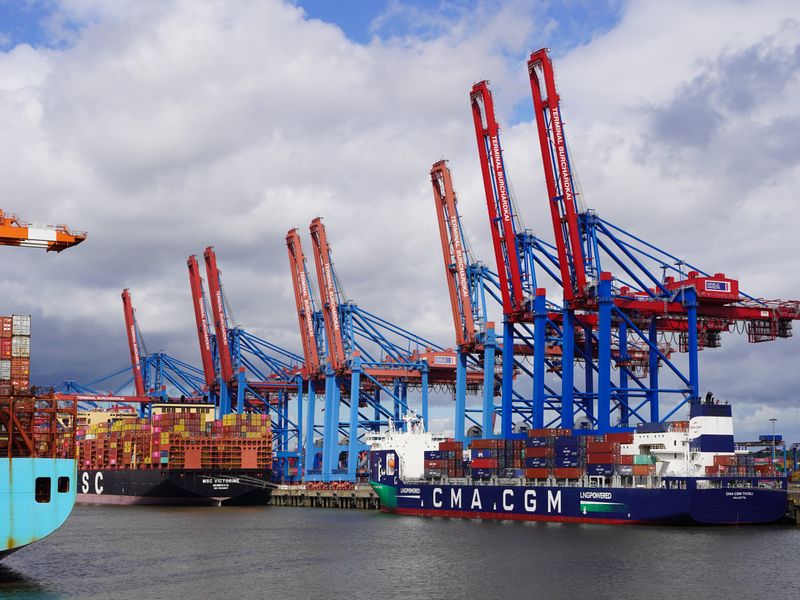 freight containers stacked at Caribbean port terminal