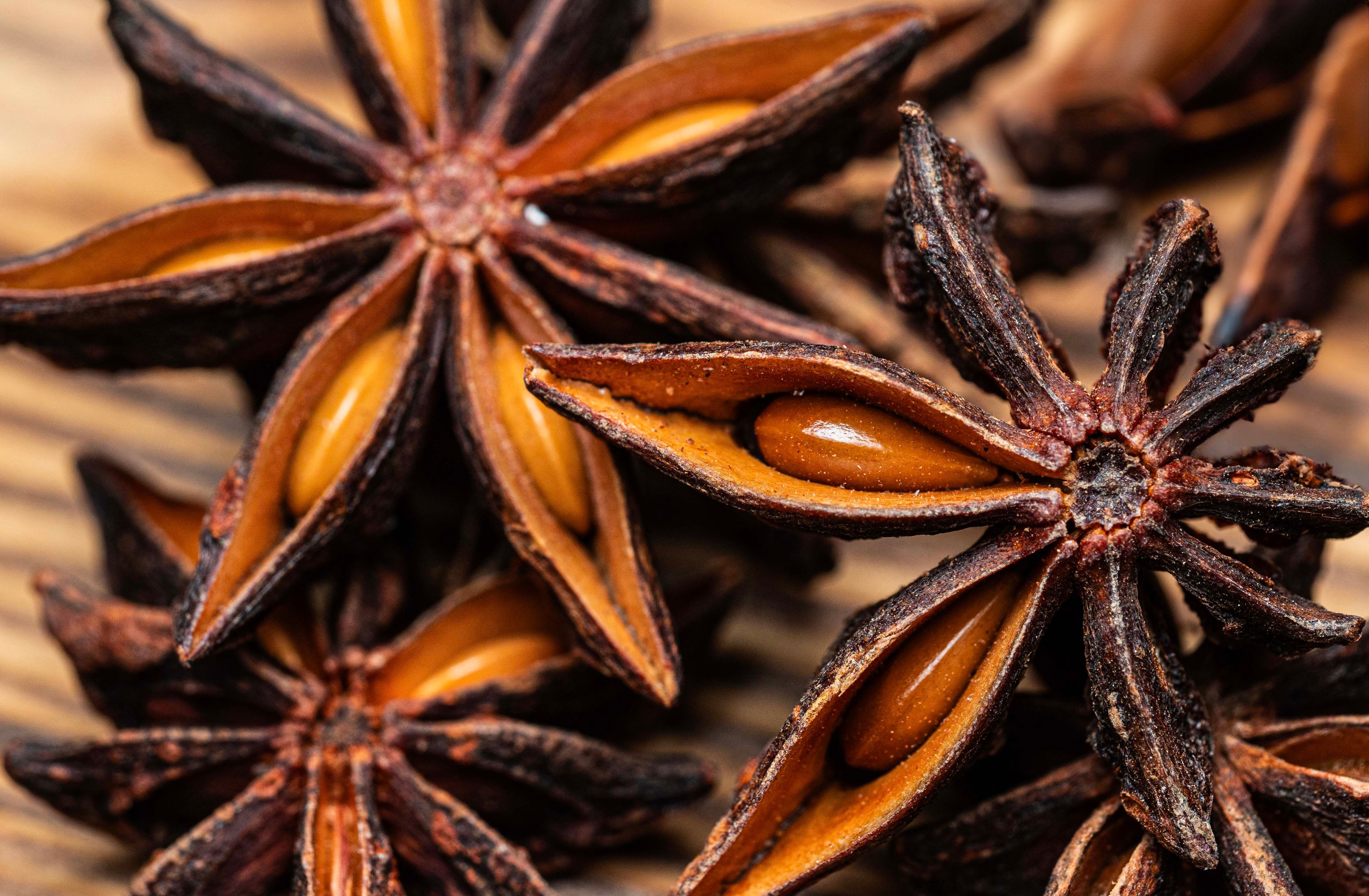 close-up-of-star-anise-spice-on-wooden-surface-free-stock-photo