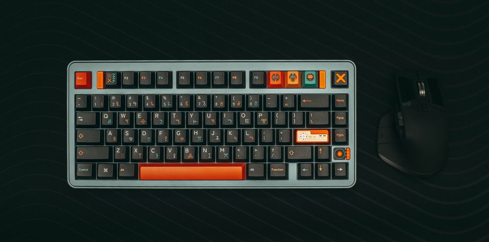 Mechanical gaming keyboard and precision mouse on a dark desktop