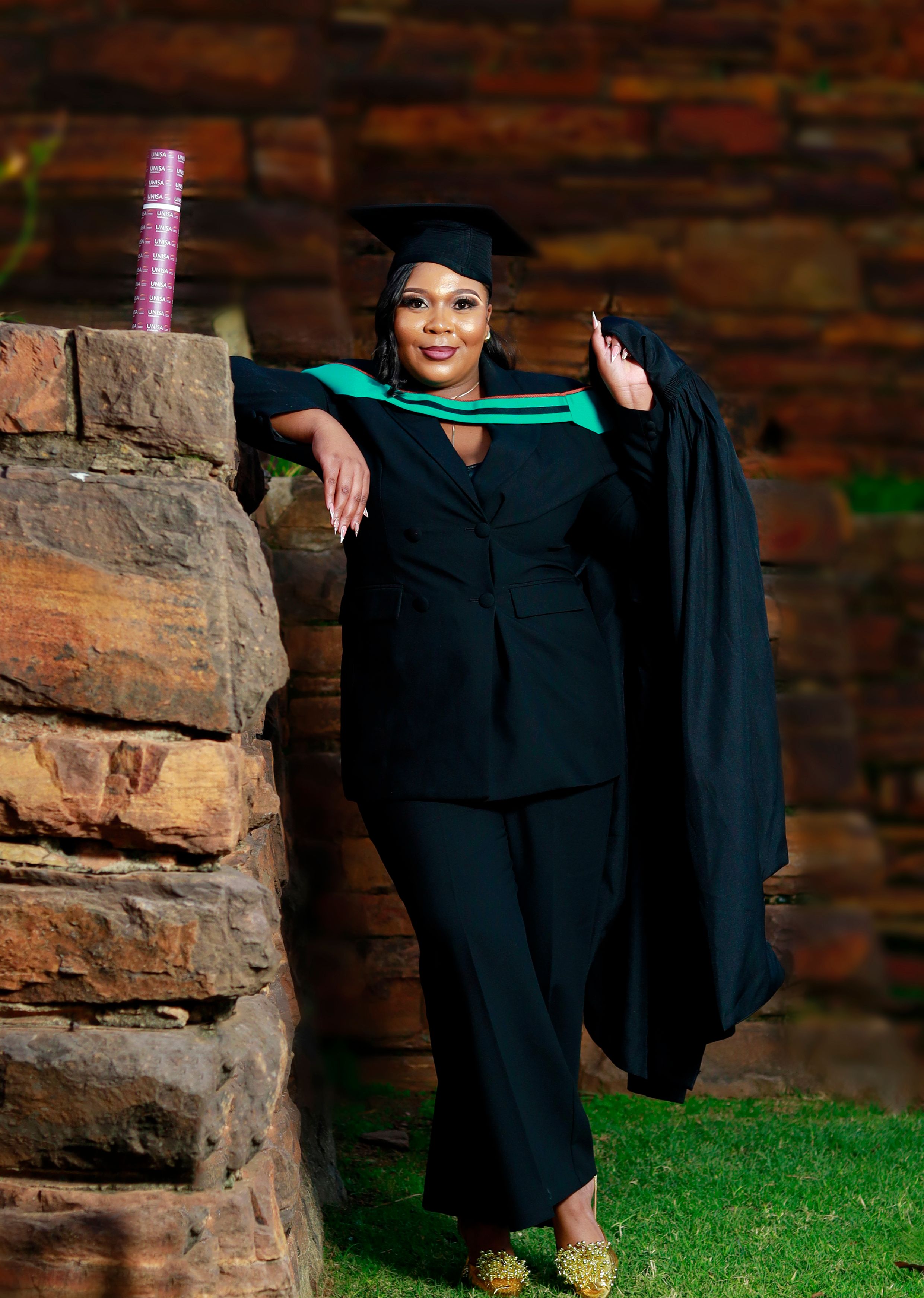Graduation Portrait with Cap and Gown Outdoors · Free Stock Photo