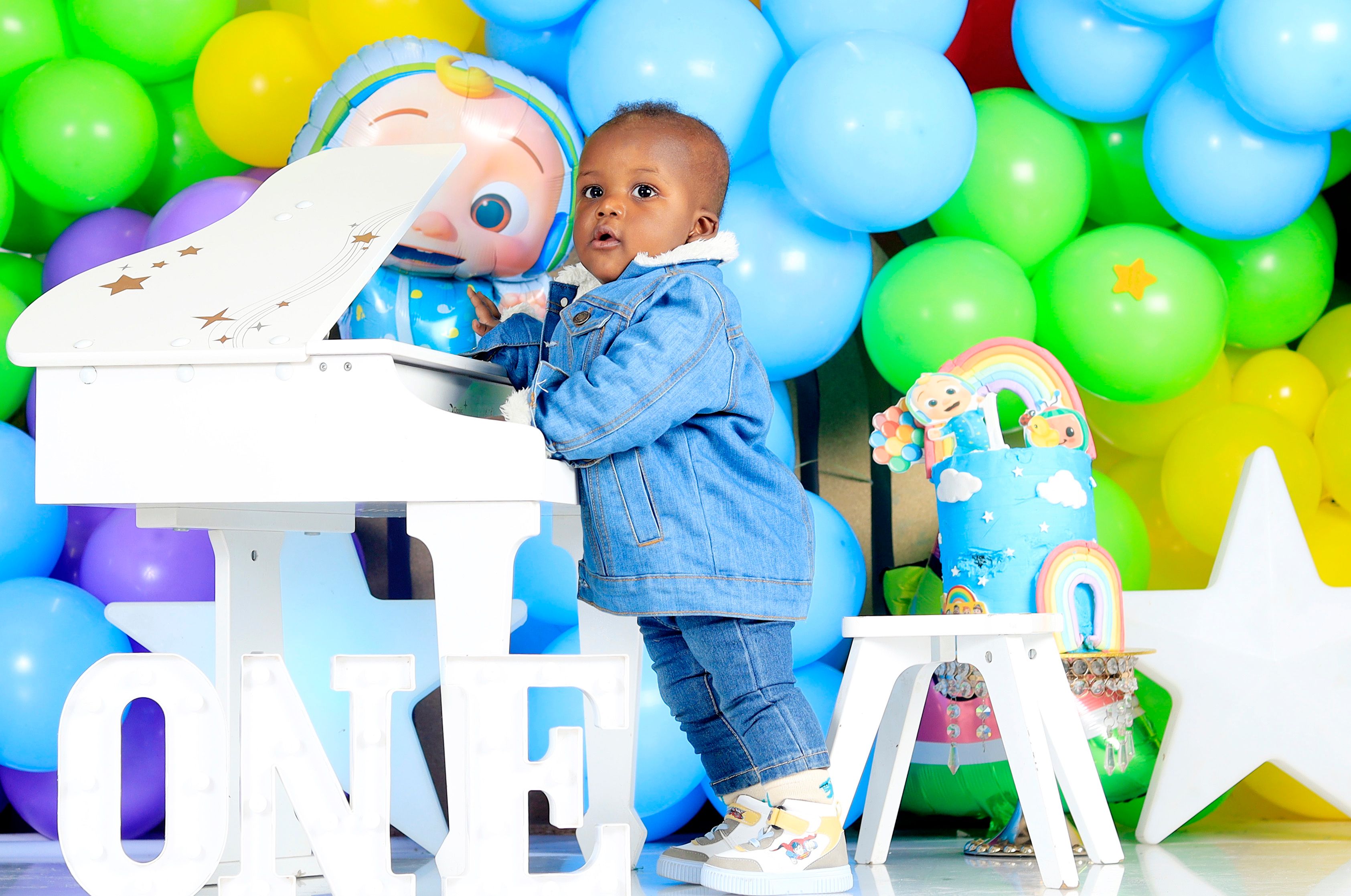 Colorful First Birthday Celebration Scene · Free Stock Photo
